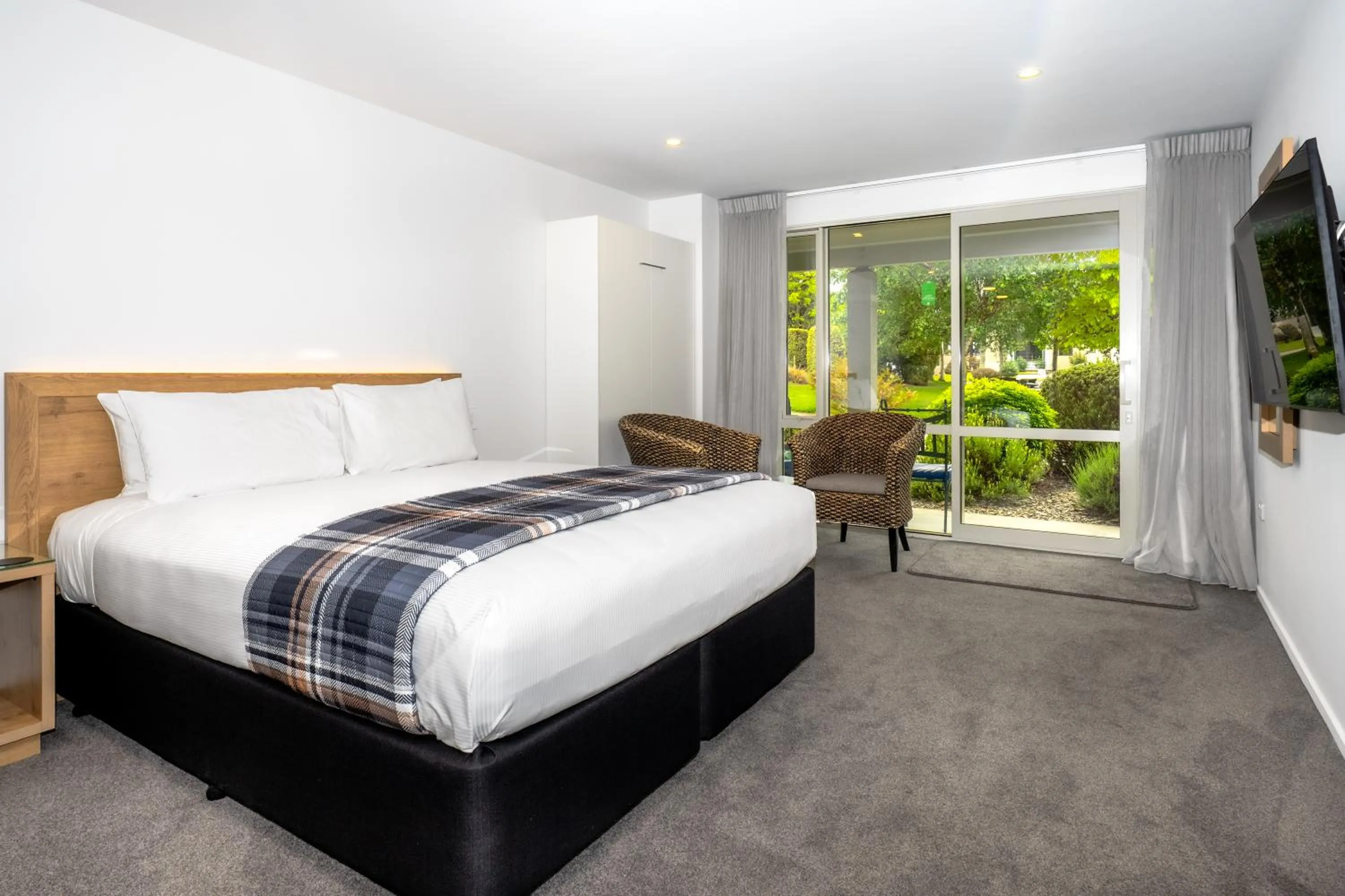 Bed in Colonial Manor Motel