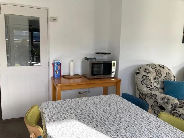 Bed in Colonial Manor Motel