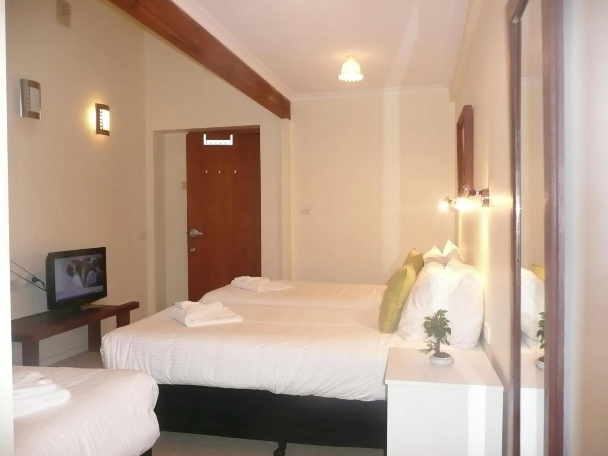 Bed in Getaway Inn Boutique Guest house