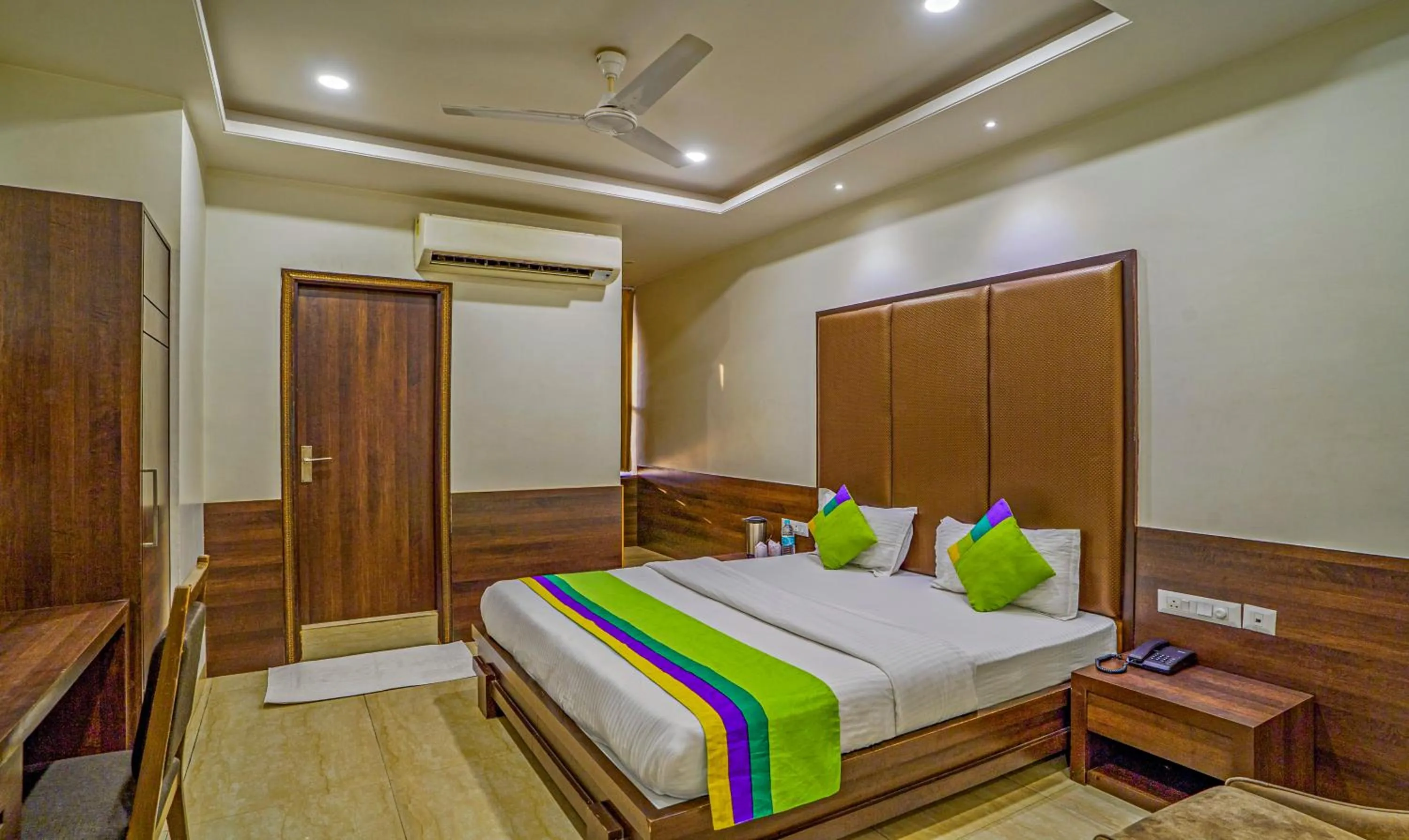 Bedroom, Bed in Treebo Bliss