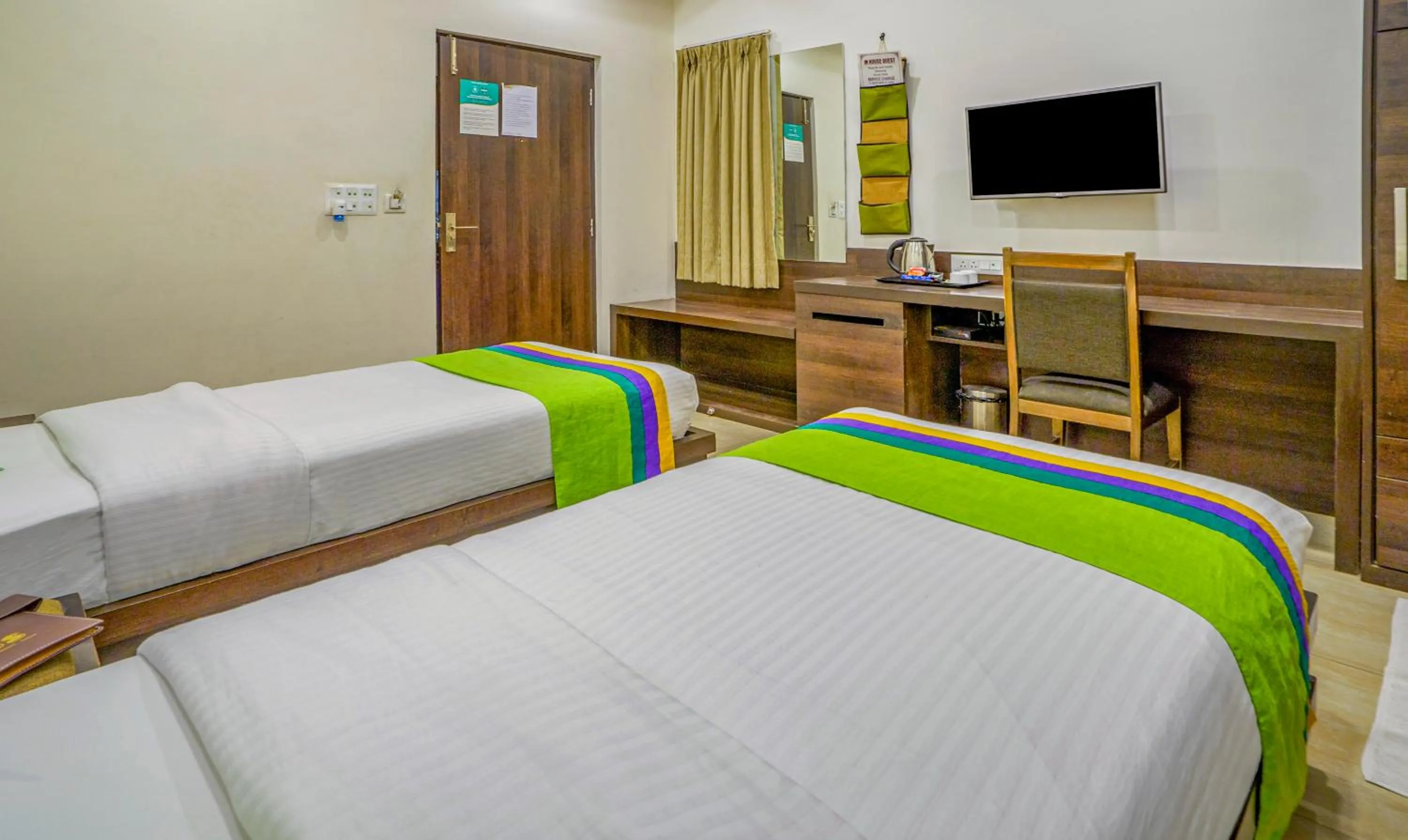 Bedroom, Bed in Treebo Bliss