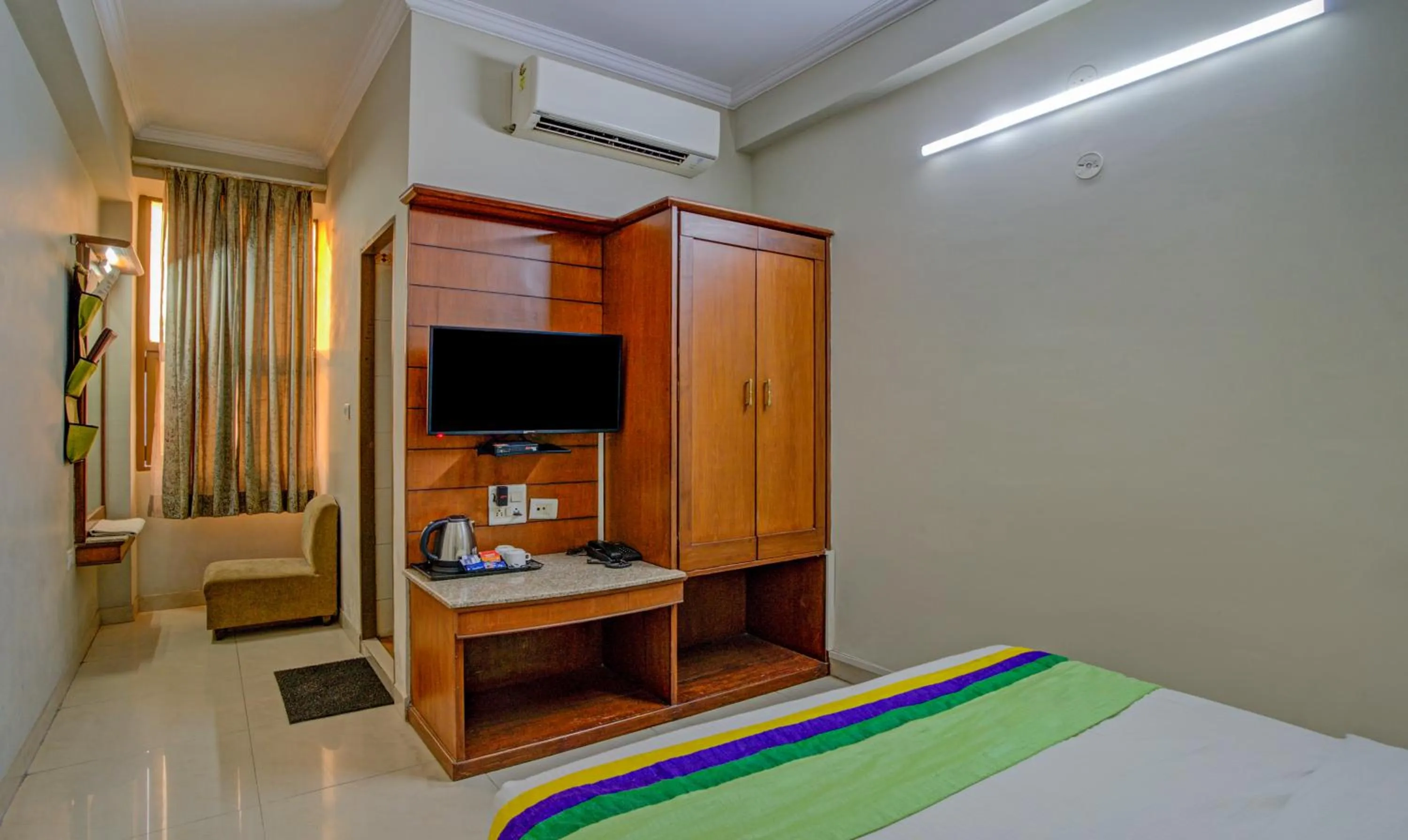 Bedroom, Bed in Treebo Bliss