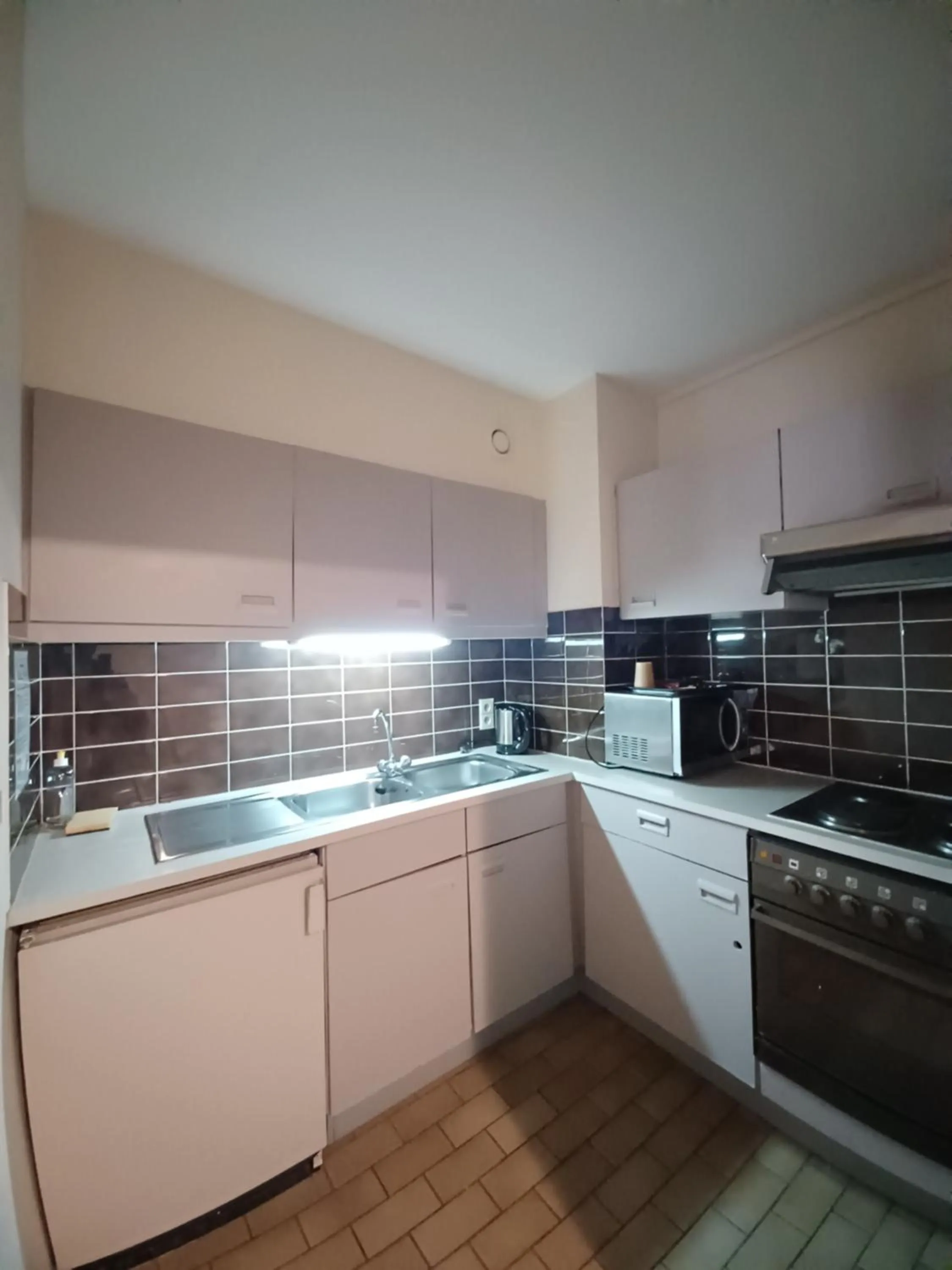 Kitchen or kitchenette in Hotel Koffieboontje