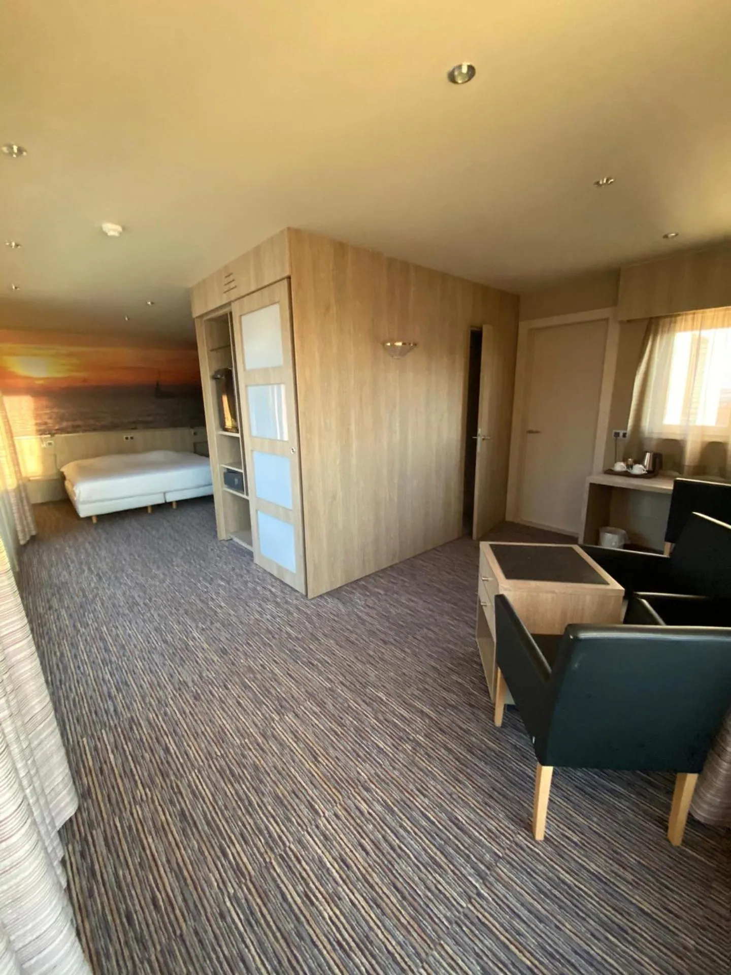 Seating area, Bed in Hotel Bero