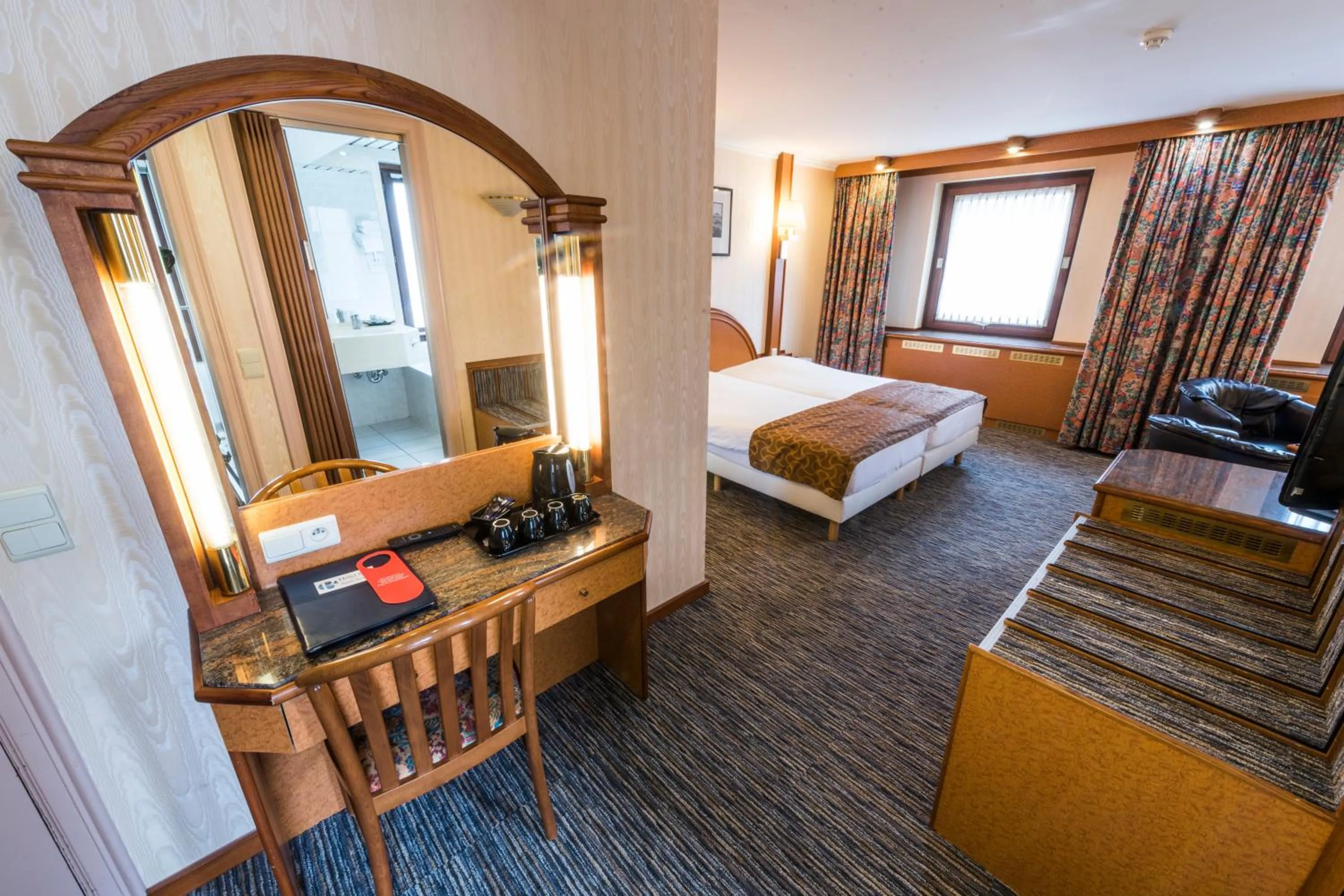 Living room, Bed in Hotel Bero