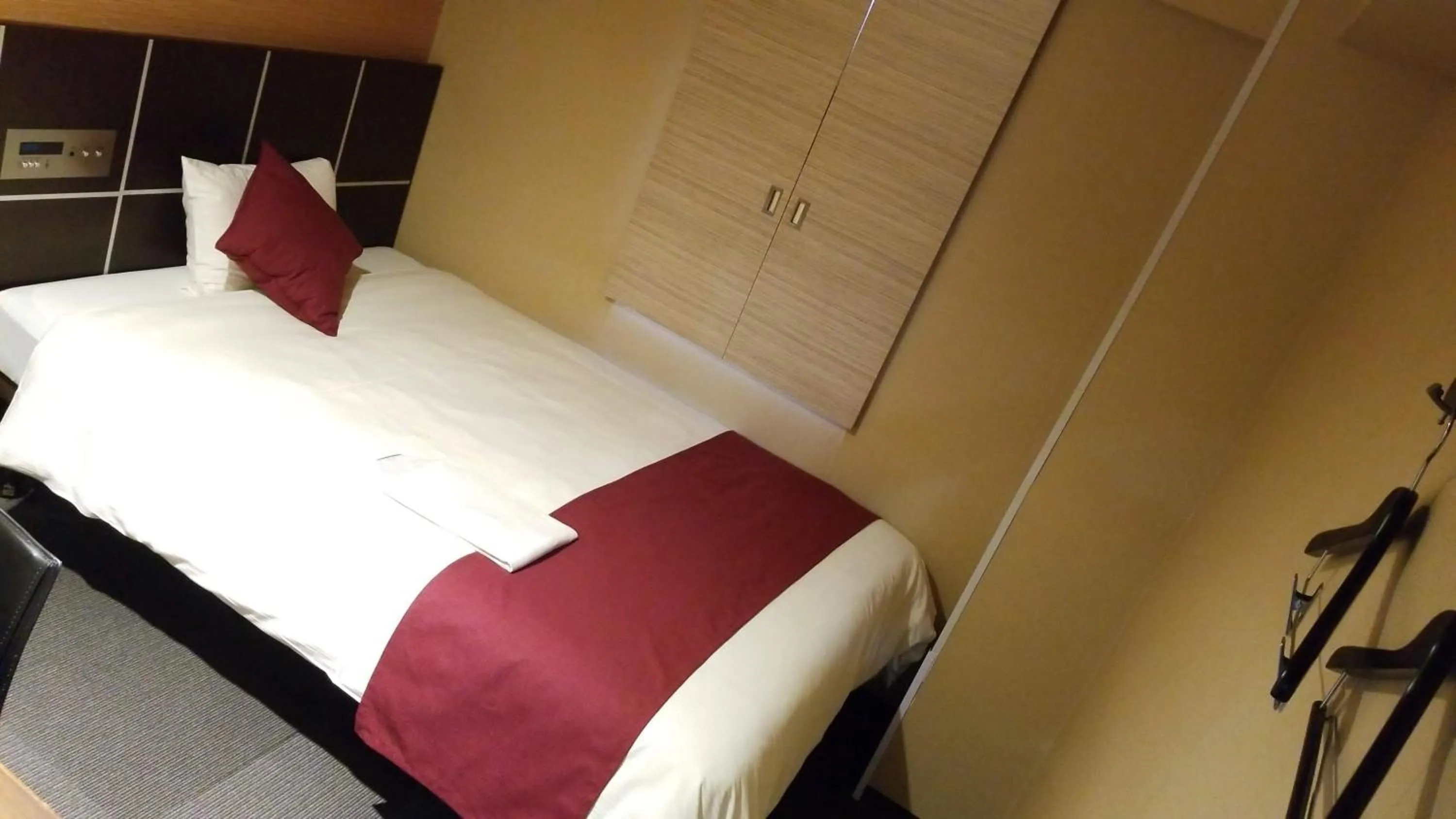 Bed in MyHotel Okazaki