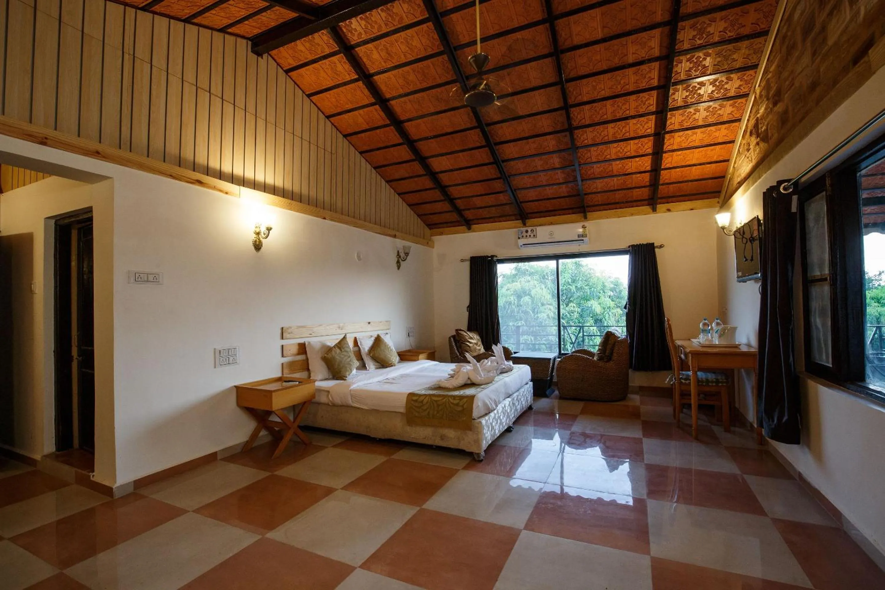 Bedroom, Bed in Gir Lions Paw Resort with Swimming Pool