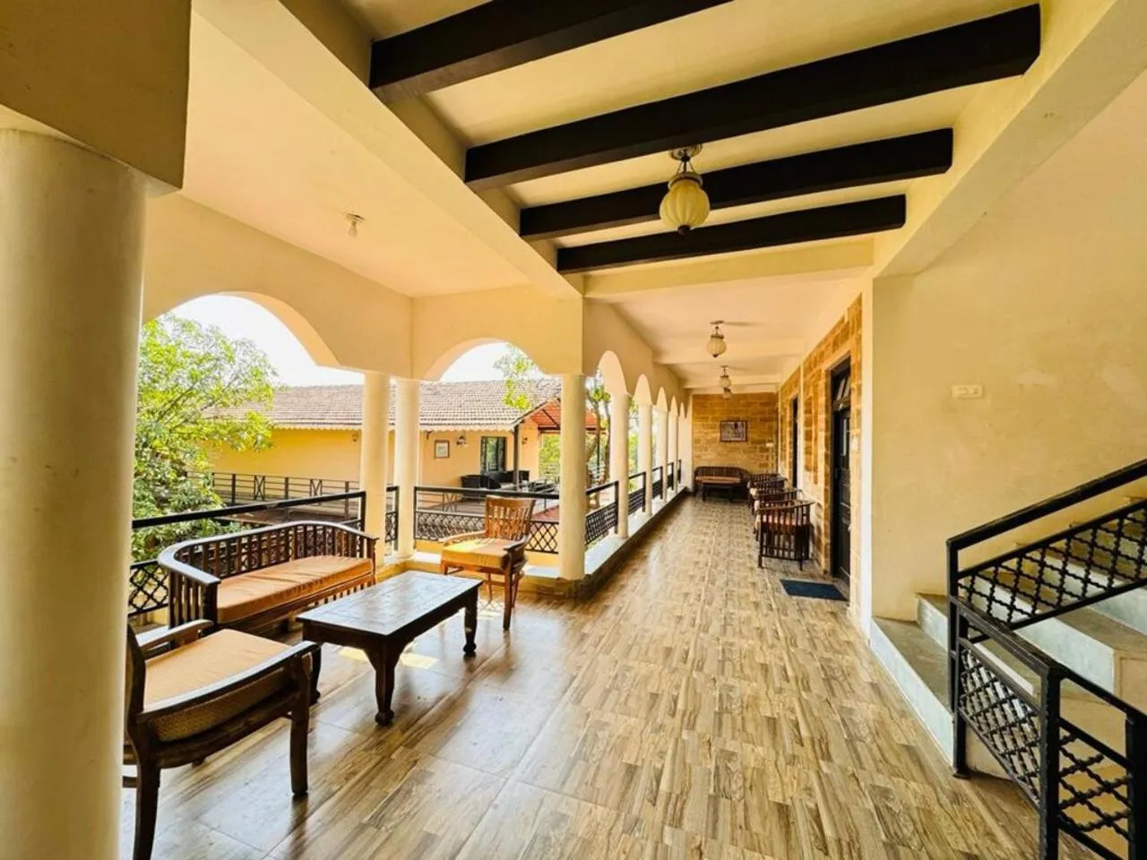 Bed in Gir Lions Paw Resort with Swimming Pool