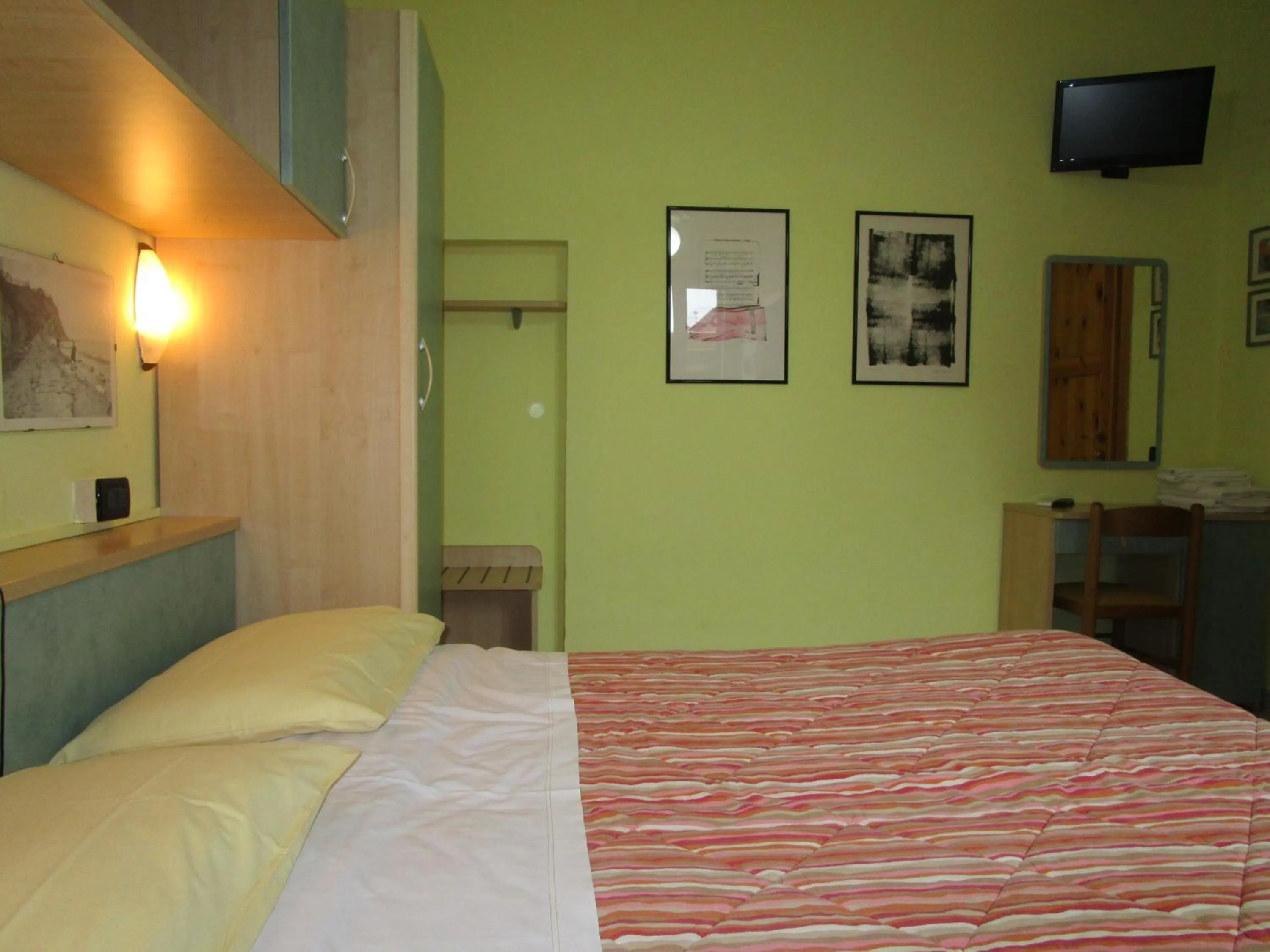 Photo of the whole room, Bed in Albergo Primavera