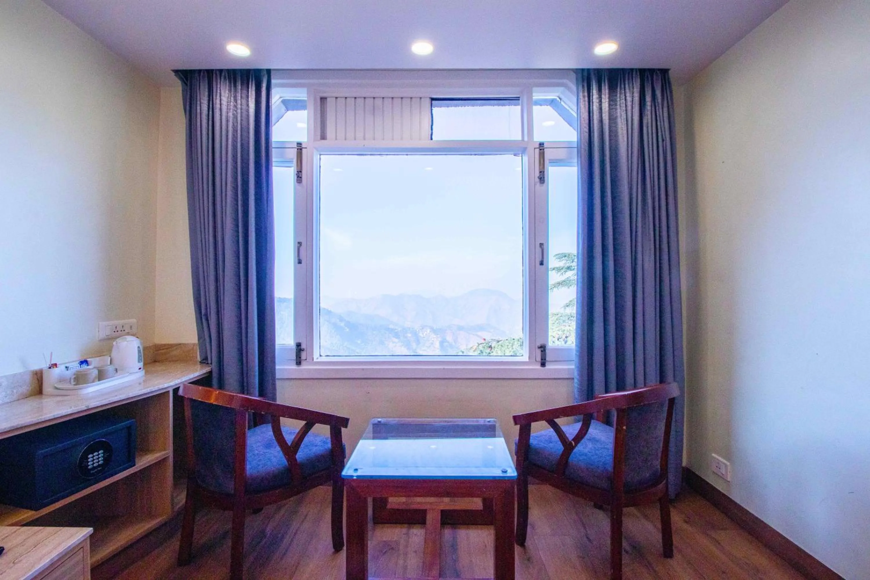 Seating area in Treebo Varuna With Mountain View, Mall Road