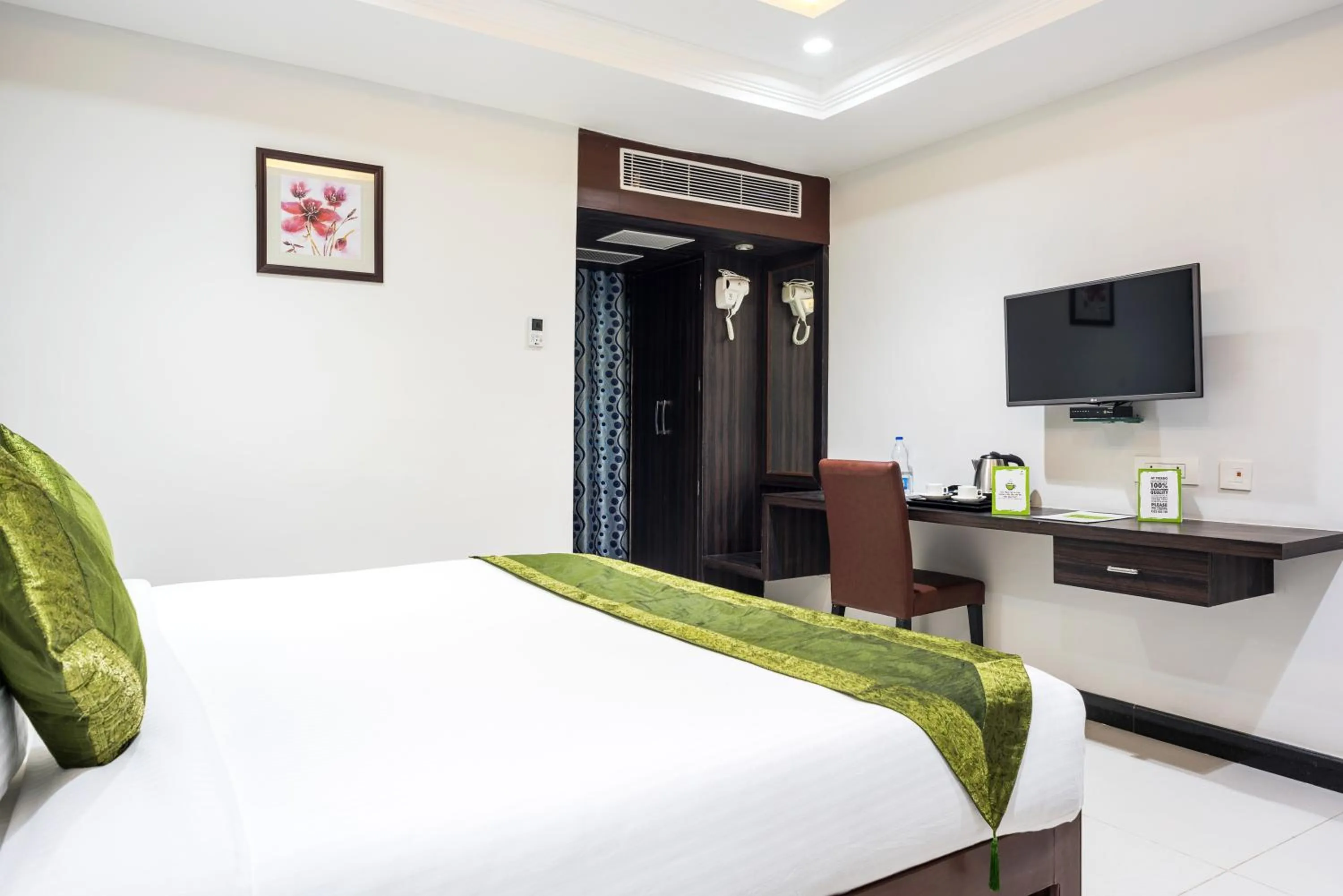 Bedroom, Bed in Treebo Empire