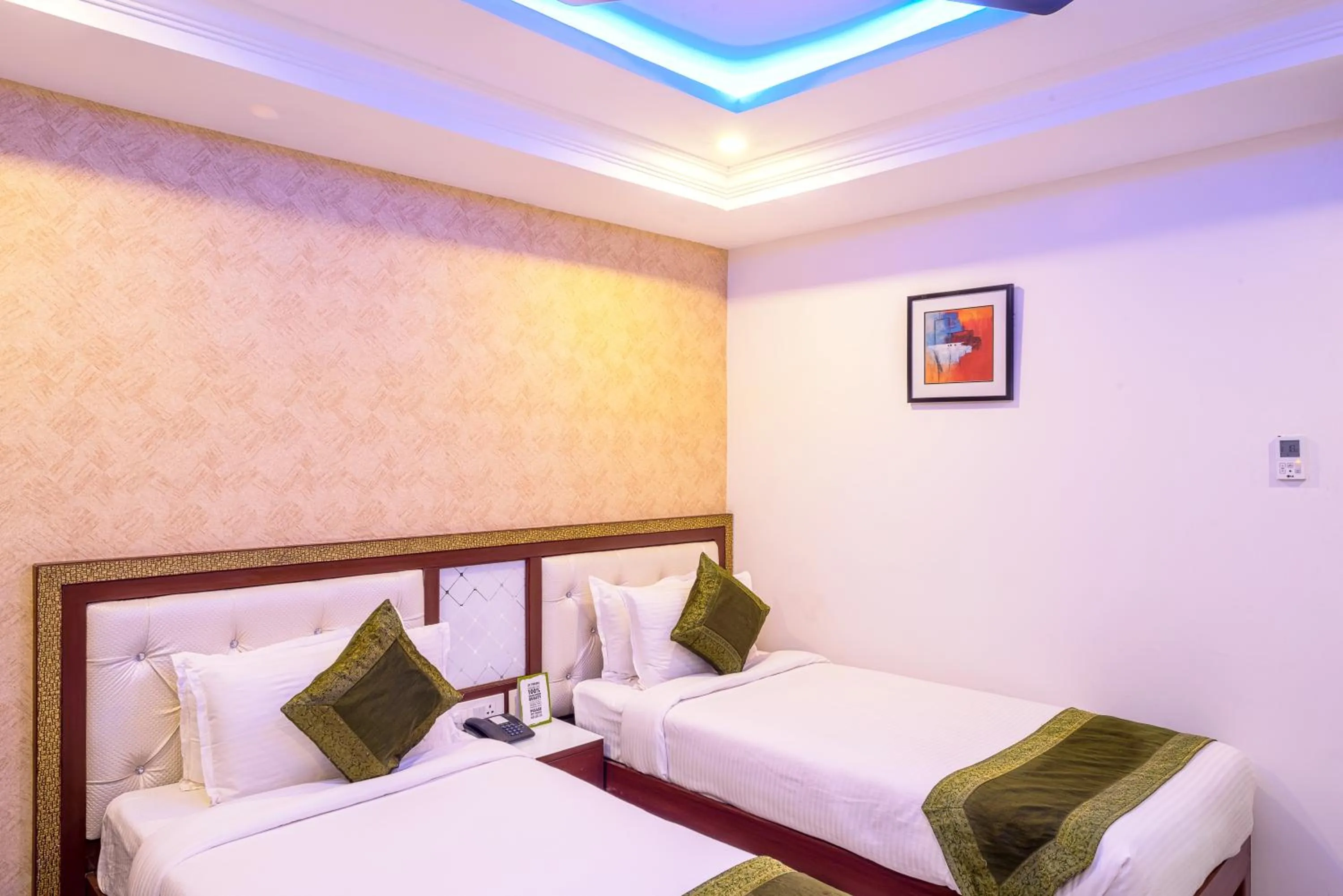 Bedroom, Bed in Treebo Empire