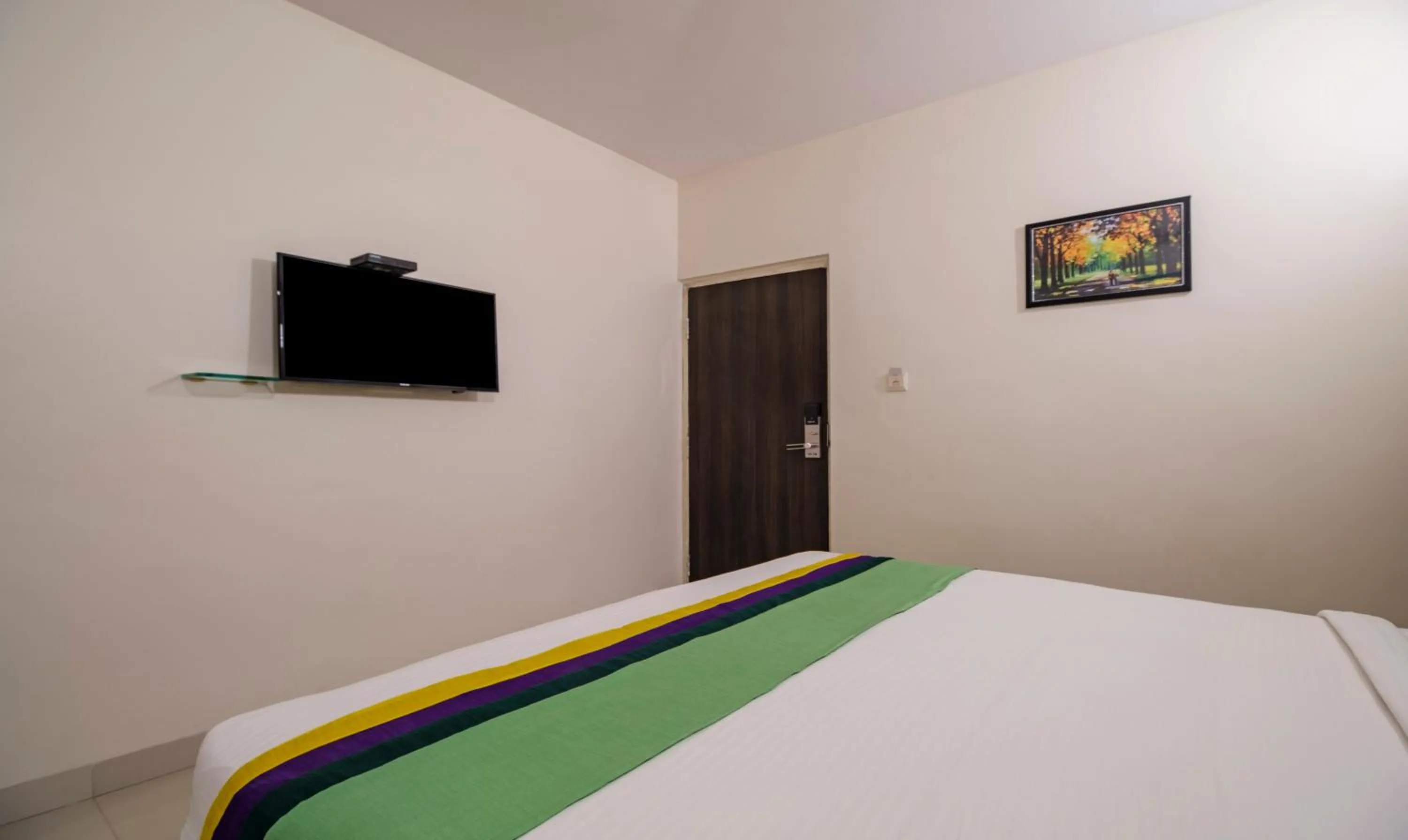 Bedroom, Bed in Treebo MVP Grand