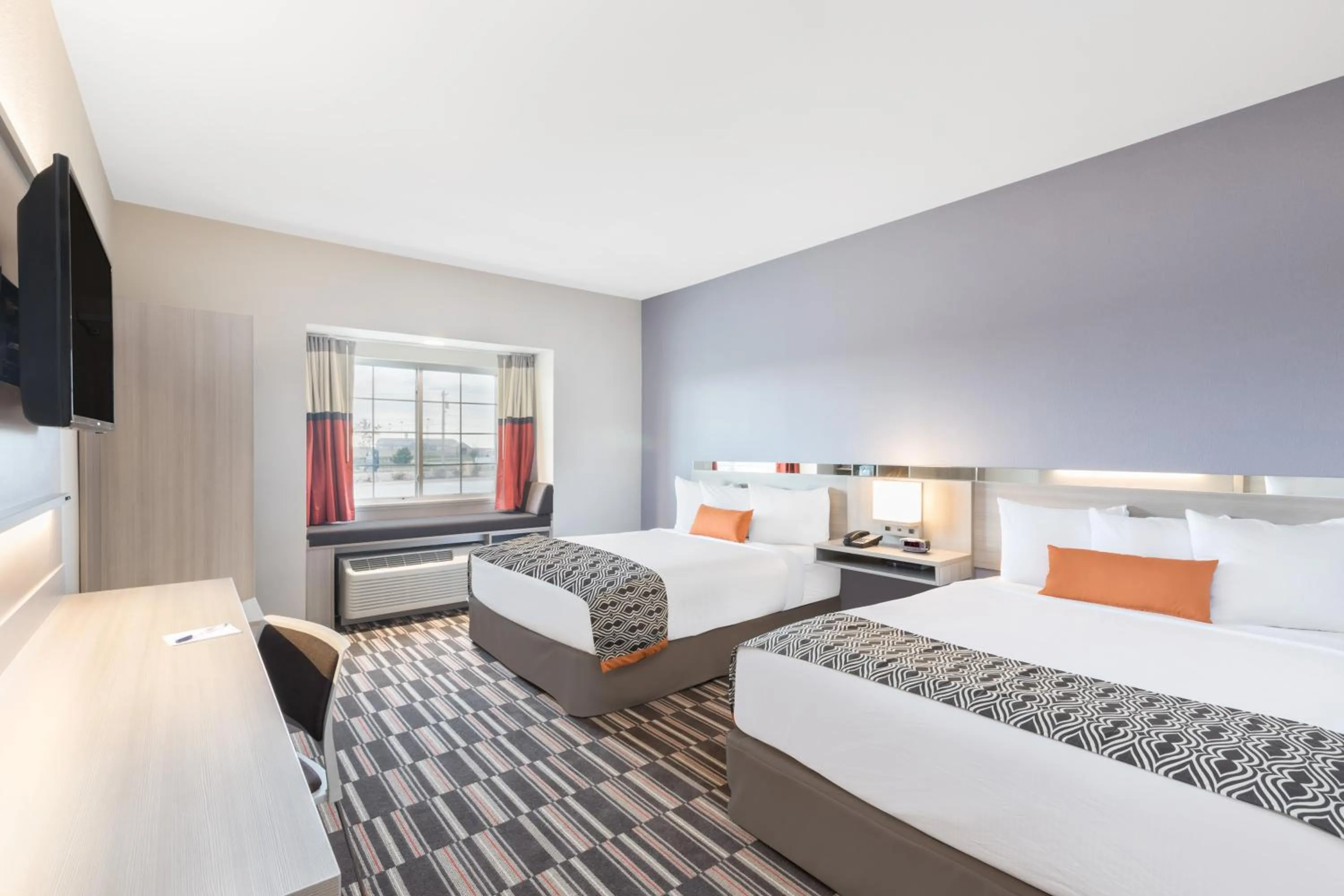 Bed in Microtel Inn & Suites by Wyndham Perry