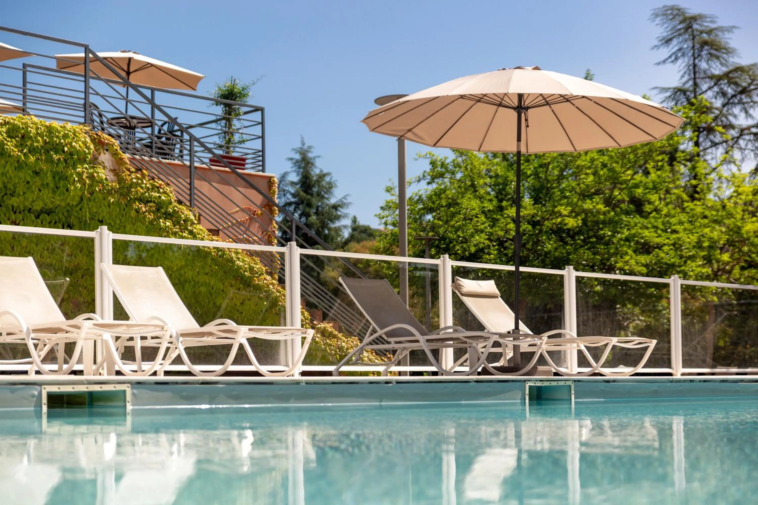 Swimming pool in Hôtel & Résidence Lou Paradou Gréoux Les Bains