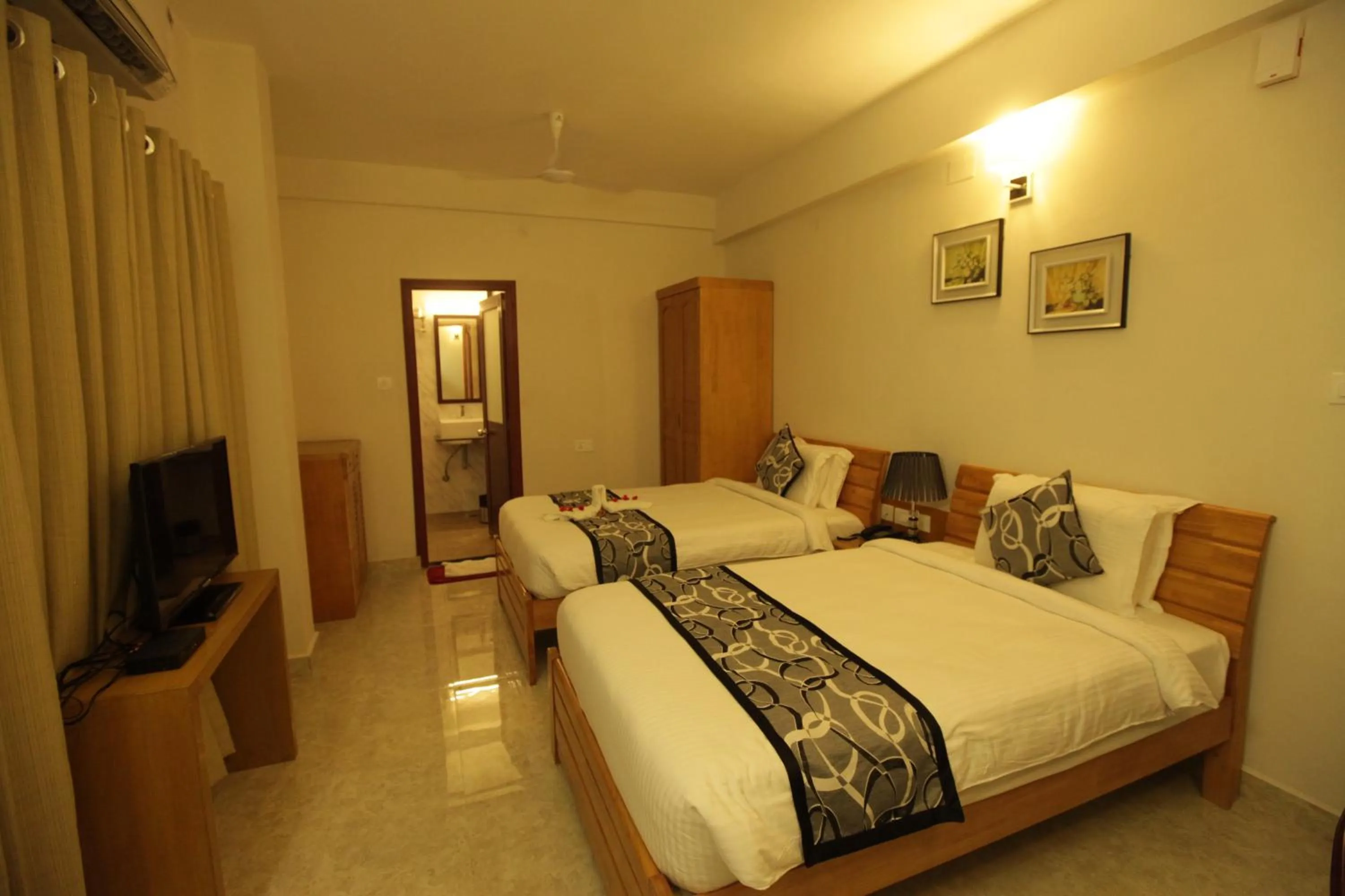 Photo of the whole room, Bed in Grand Cascade Chennai
