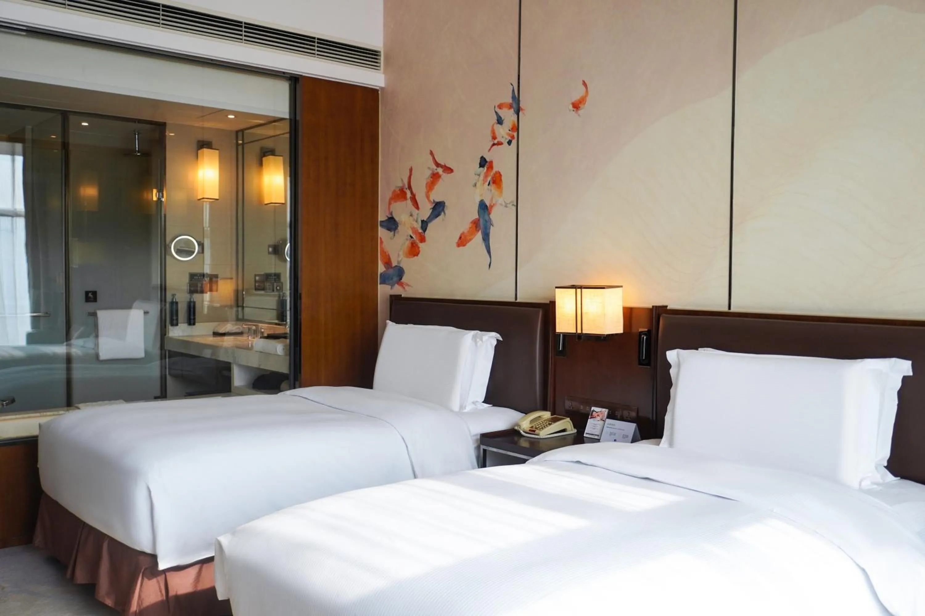 Bed in DoubleTree By Hilton Ningbo Beilun