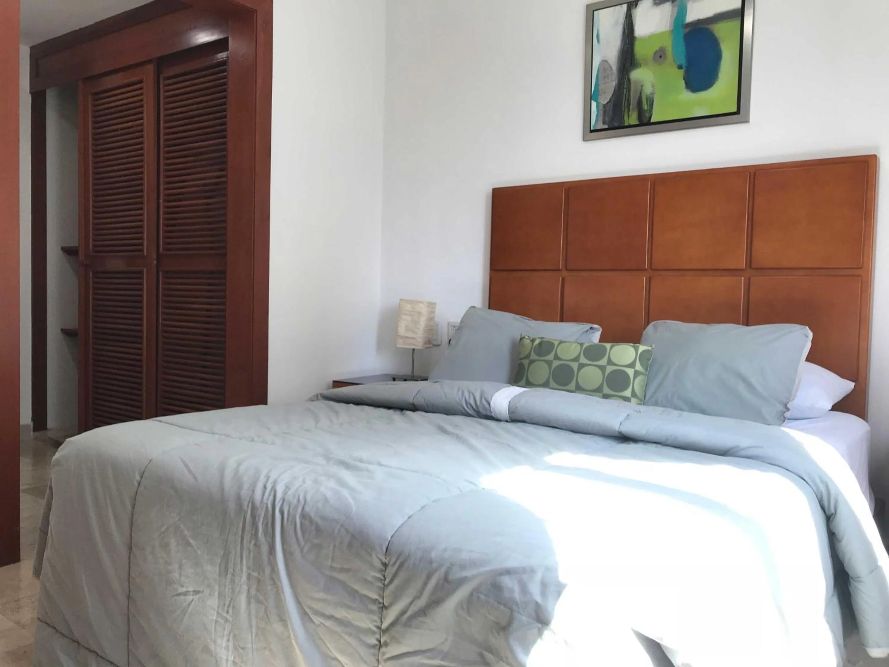 Bed in Lilas del Mar Apartments