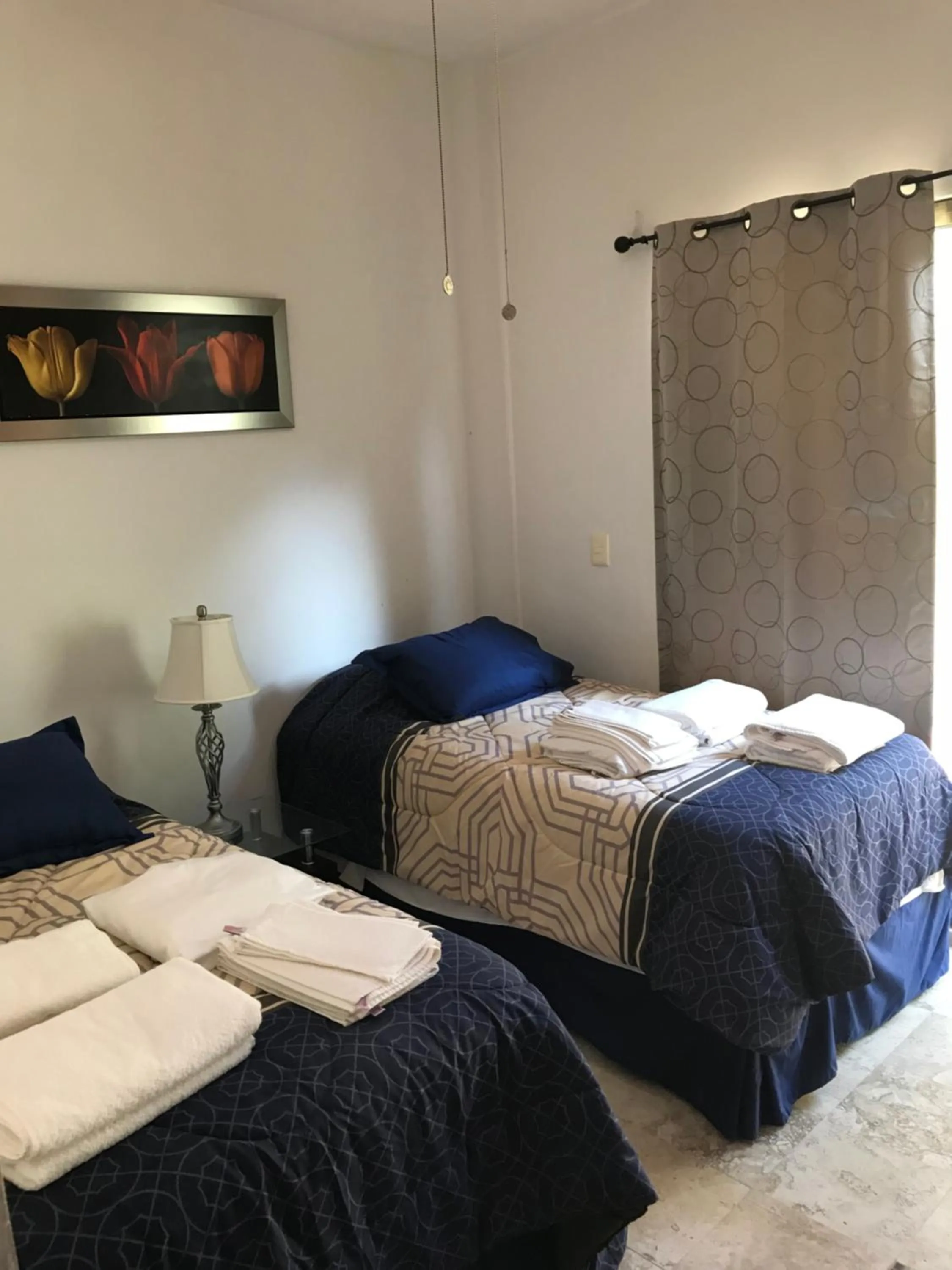 Bed in Lilas del Mar Apartments