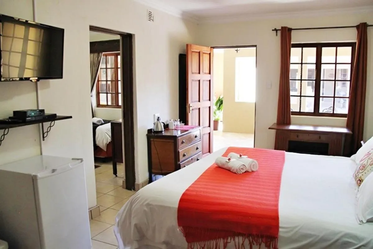 Photo of the whole room, Bed in Greenleaf Guest Lodge