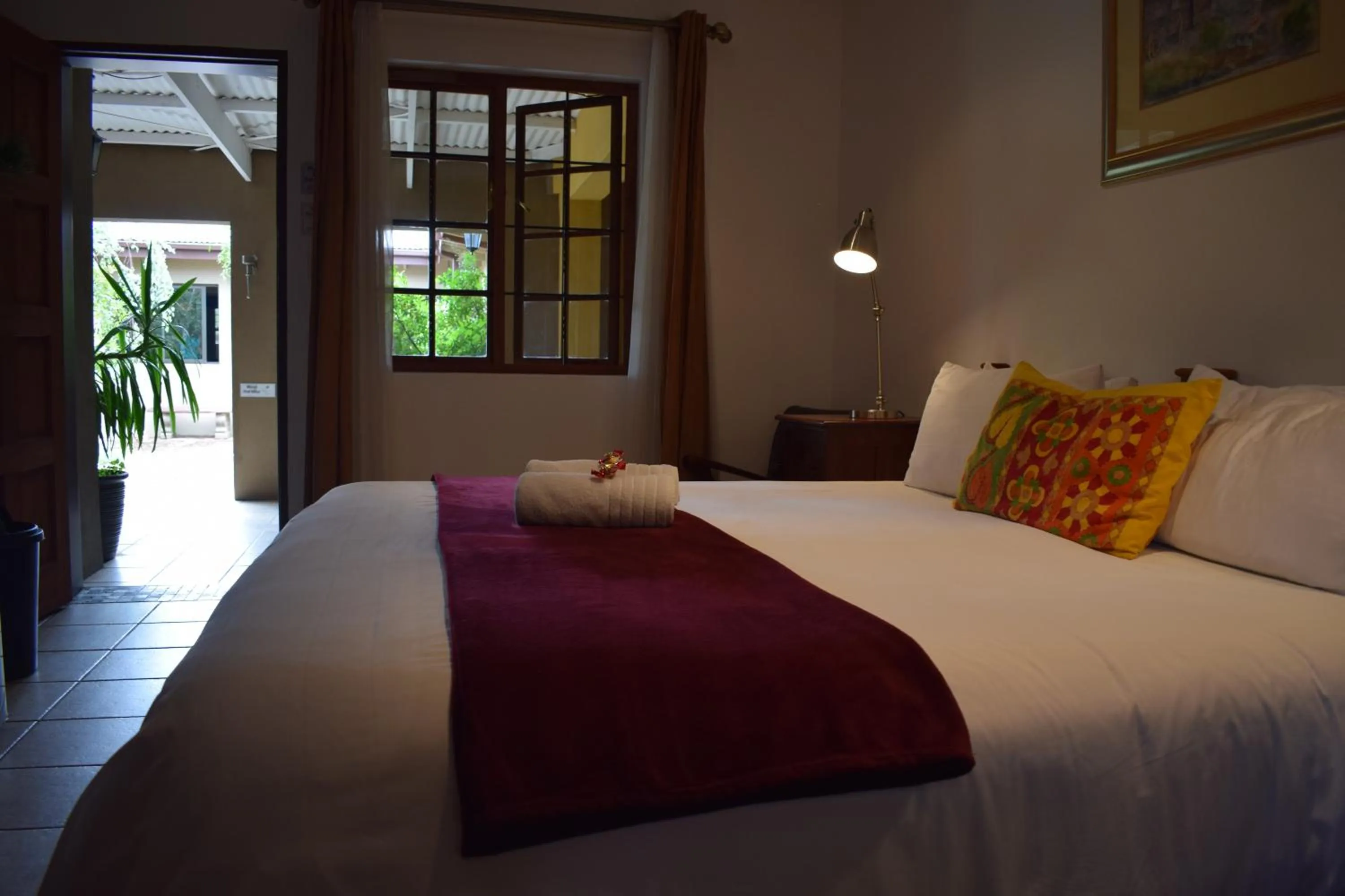 Bed in Greenleaf Guest Lodge