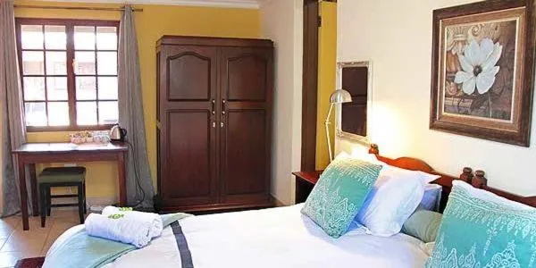 Photo of the whole room, Bed in Greenleaf Guest Lodge