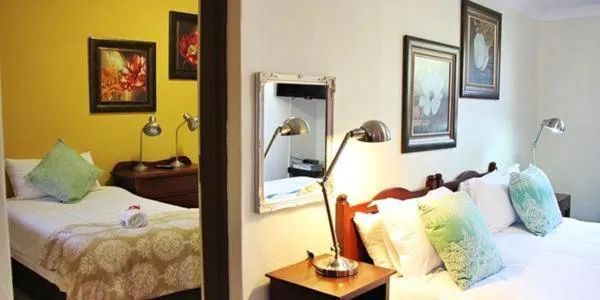 Bed in Greenleaf Guest Lodge