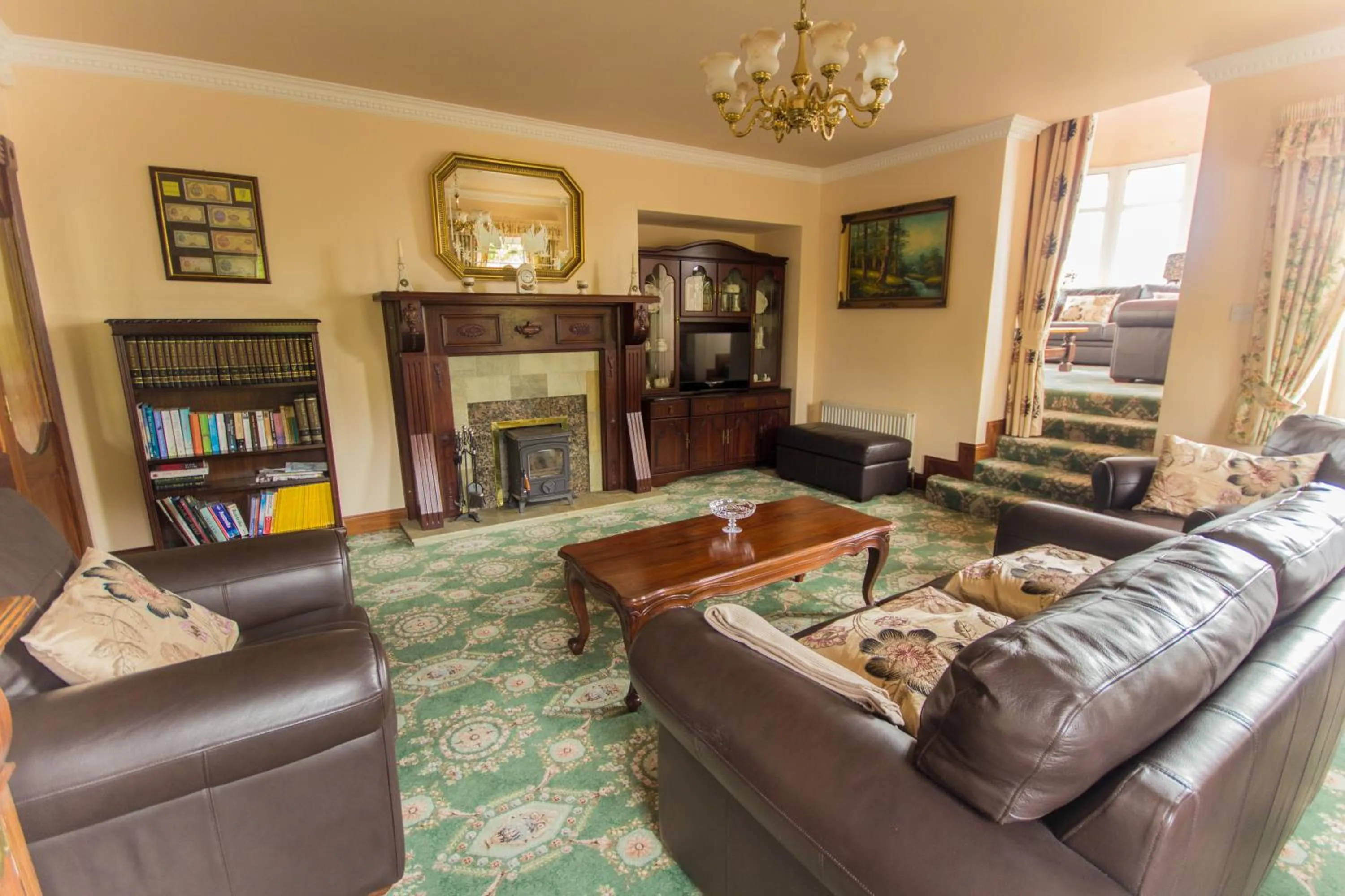 Communal lounge/ TV room in Cloghan Lodge