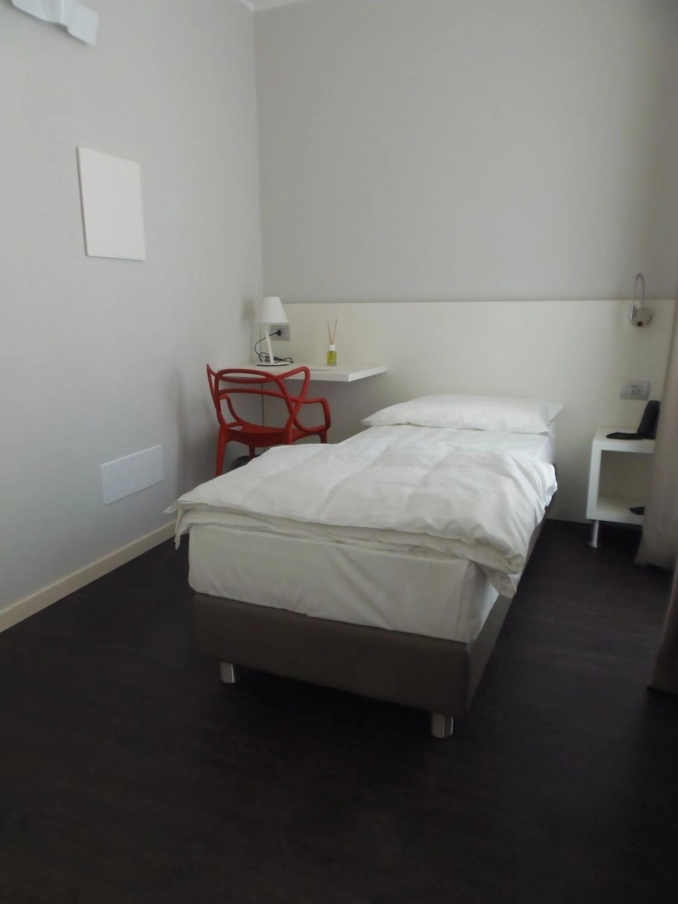 Bed in Albergo Dongo