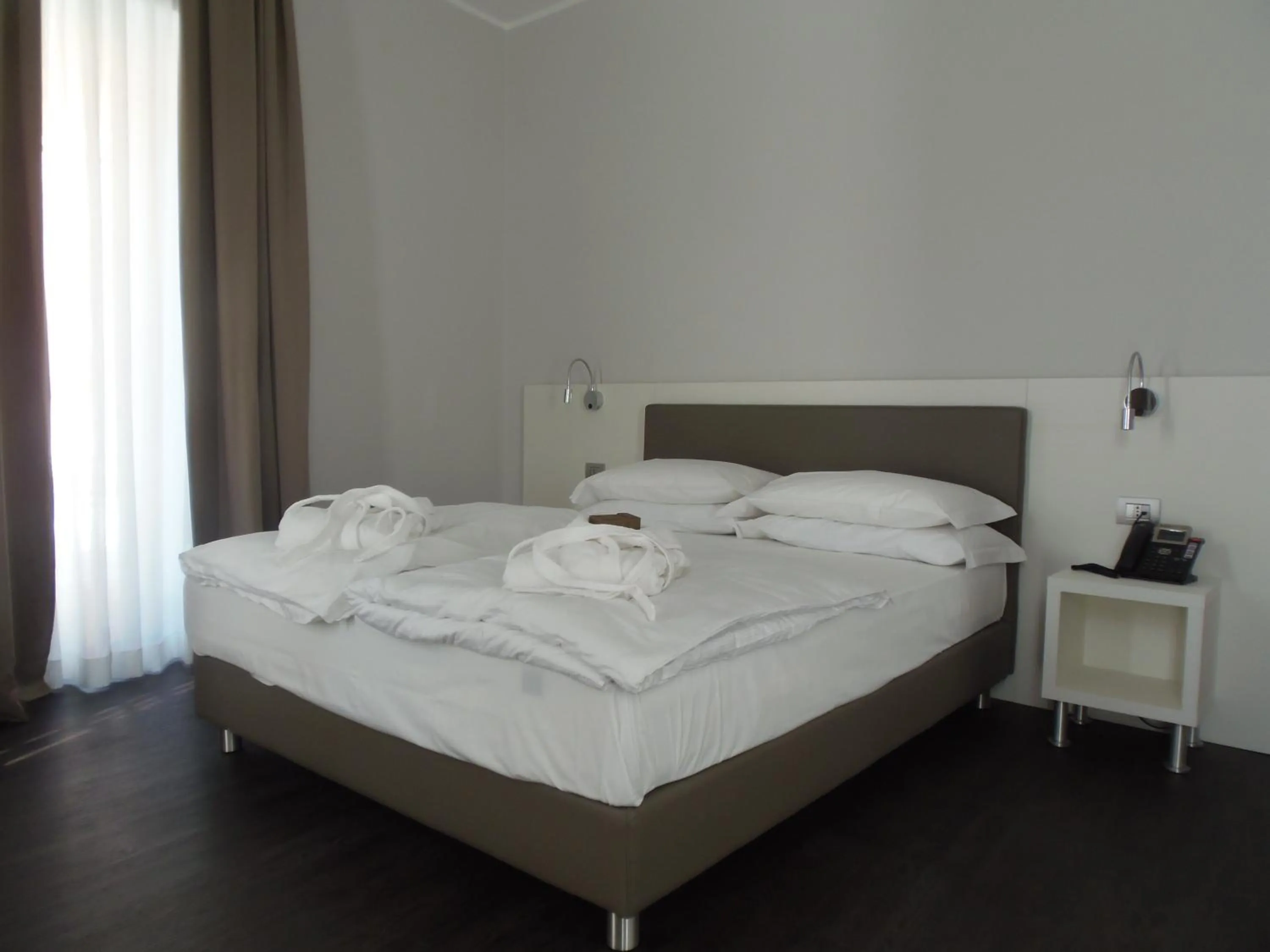 Bed in Albergo Dongo