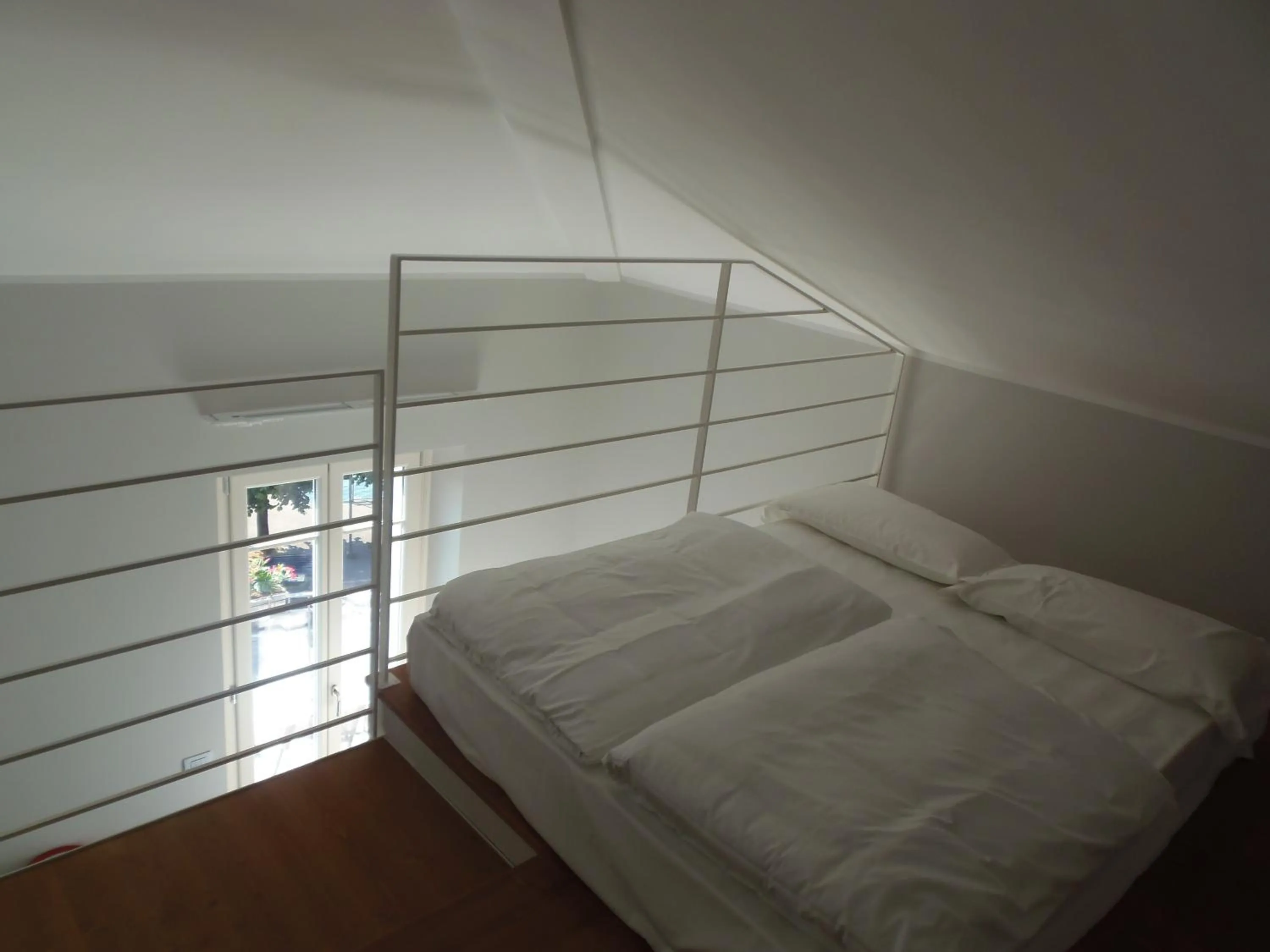 Bed in Albergo Dongo