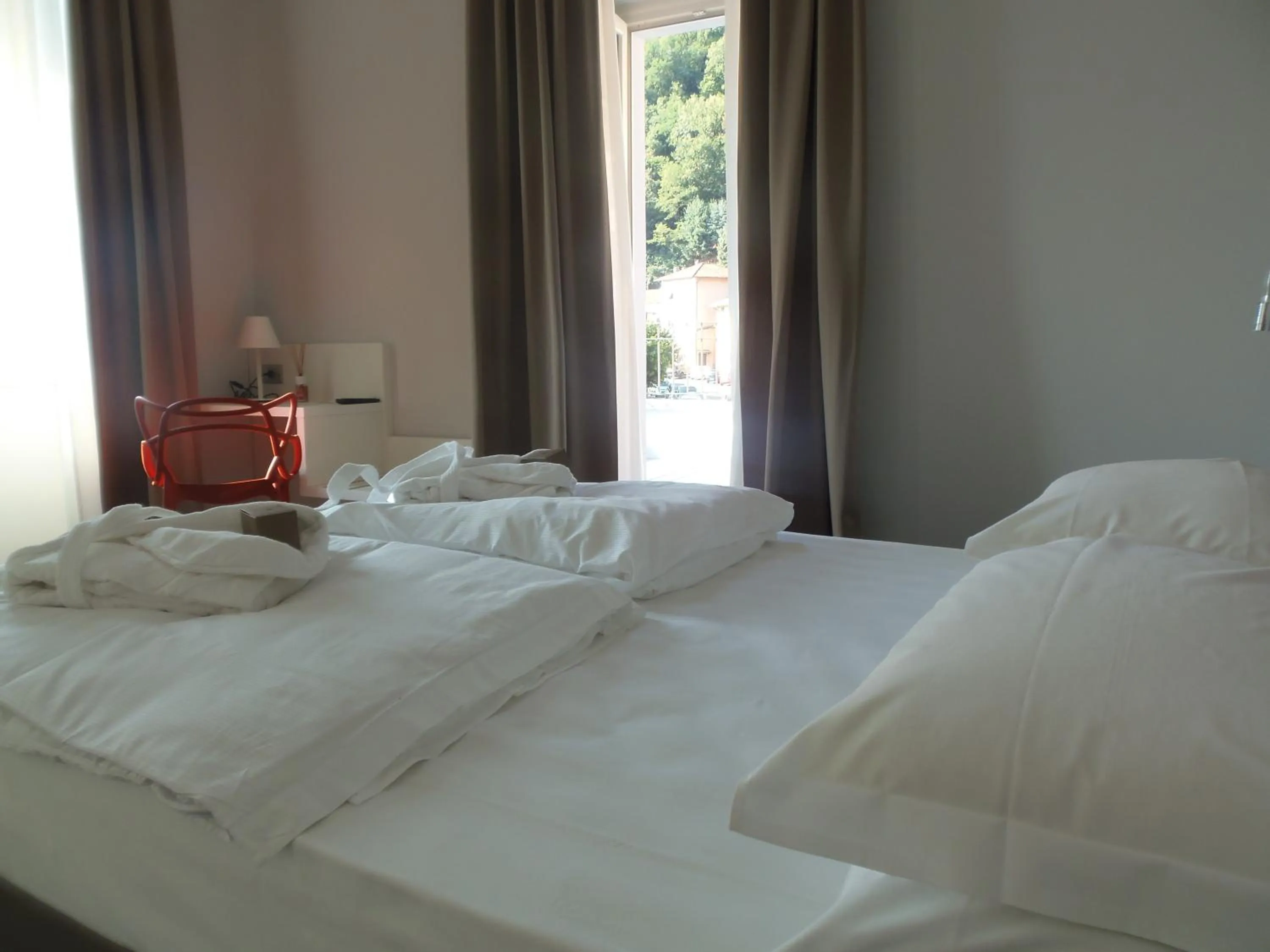 Bed in Albergo Dongo