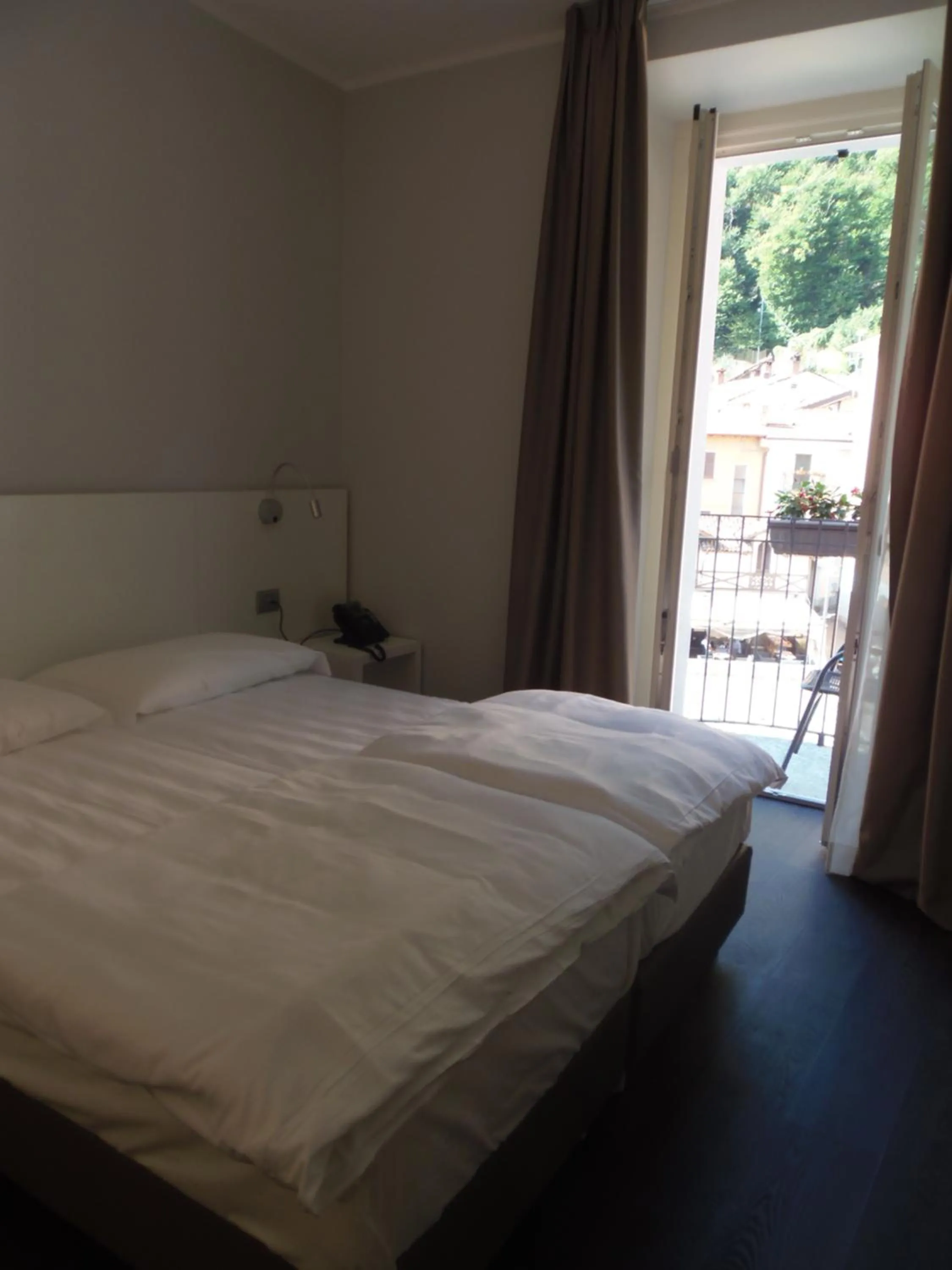 Bed in Albergo Dongo