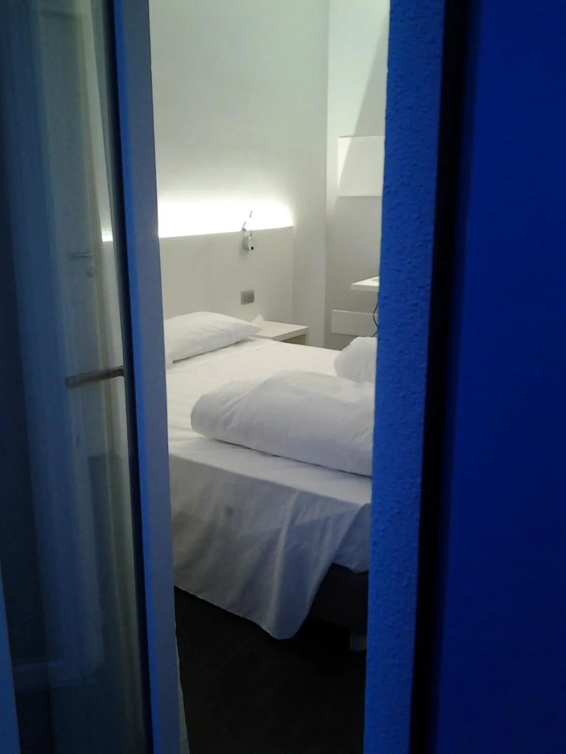 Bed in Albergo Dongo