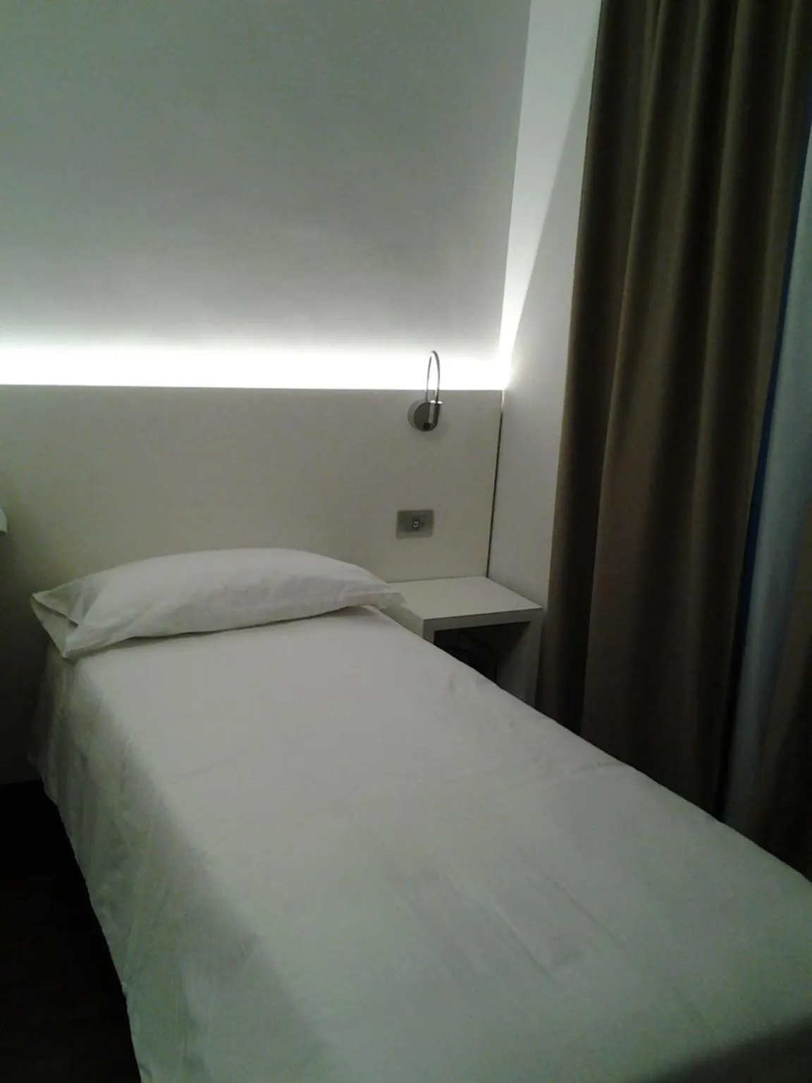 Bed in Albergo Dongo