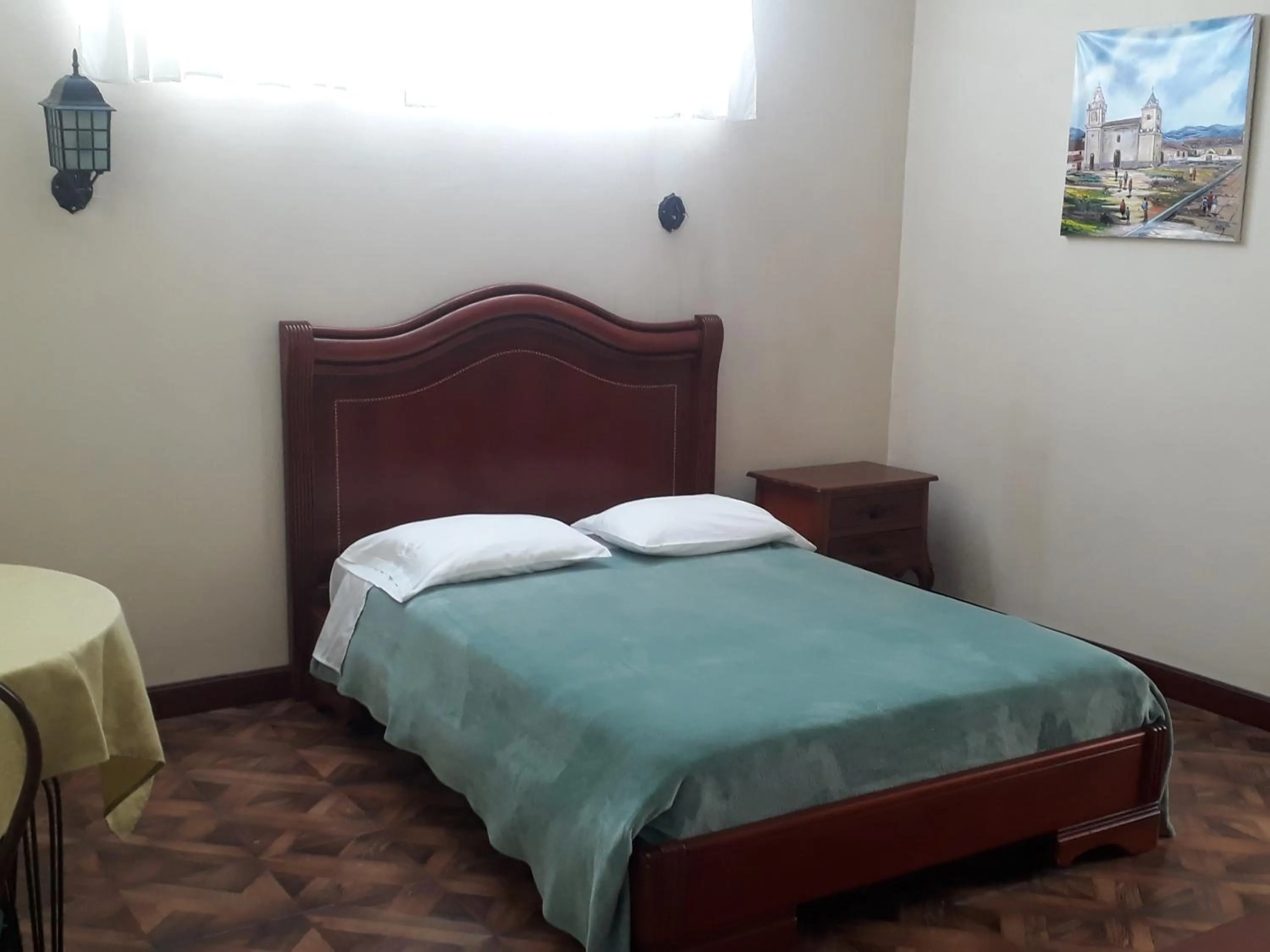 Bed in El Cardenal Hotel