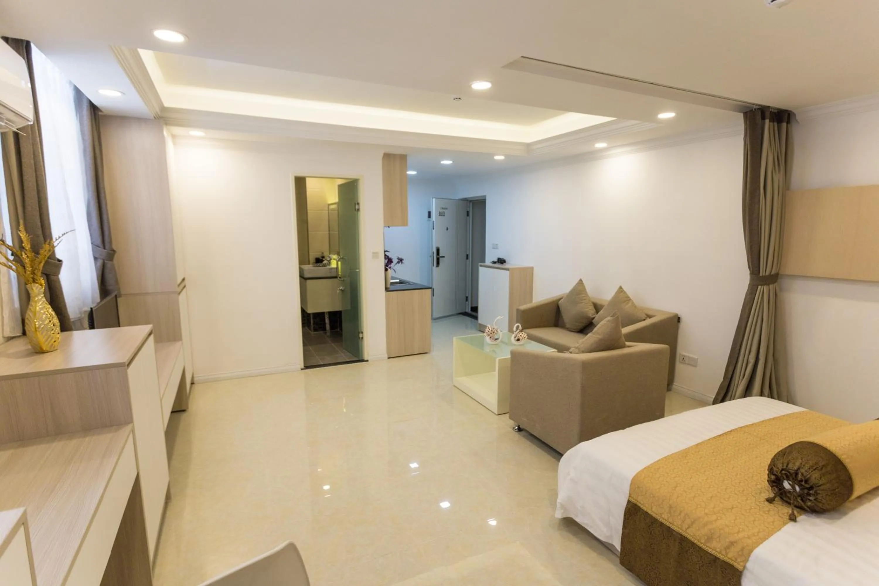 Seating area, Bed in CA&SA Serviced Apartment