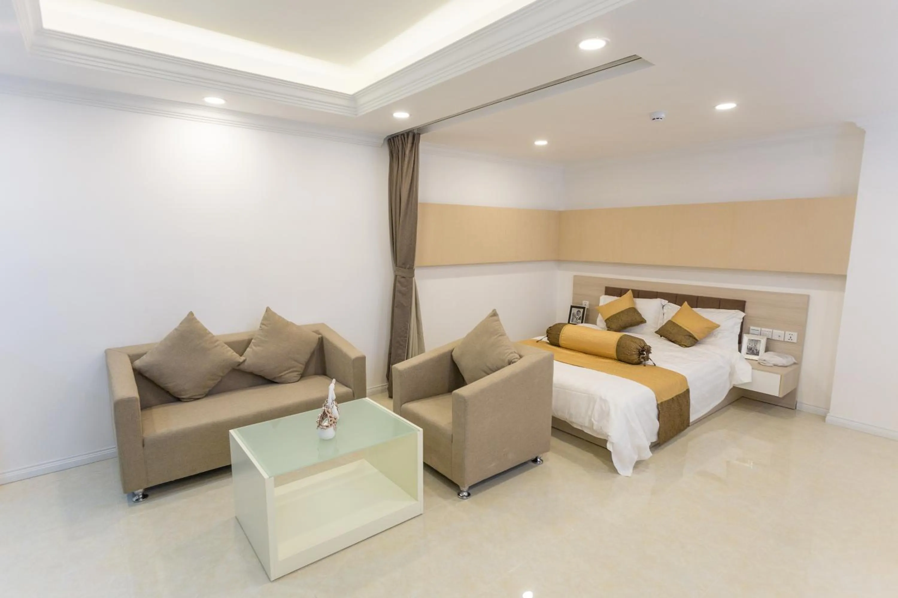 Seating area, Bed in CA&SA Serviced Apartment