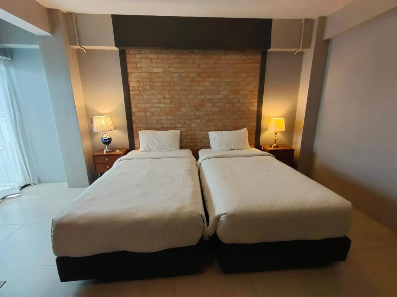 Bed in Qoo Hotel