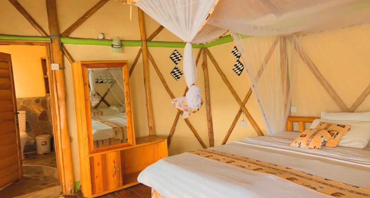 Bed in Lake Bunyonyi Rock Resort
