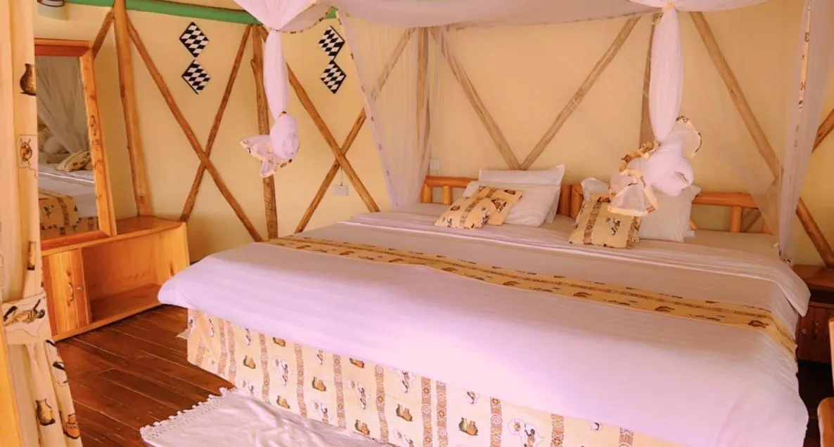 Bed in Lake Bunyonyi Rock Resort
