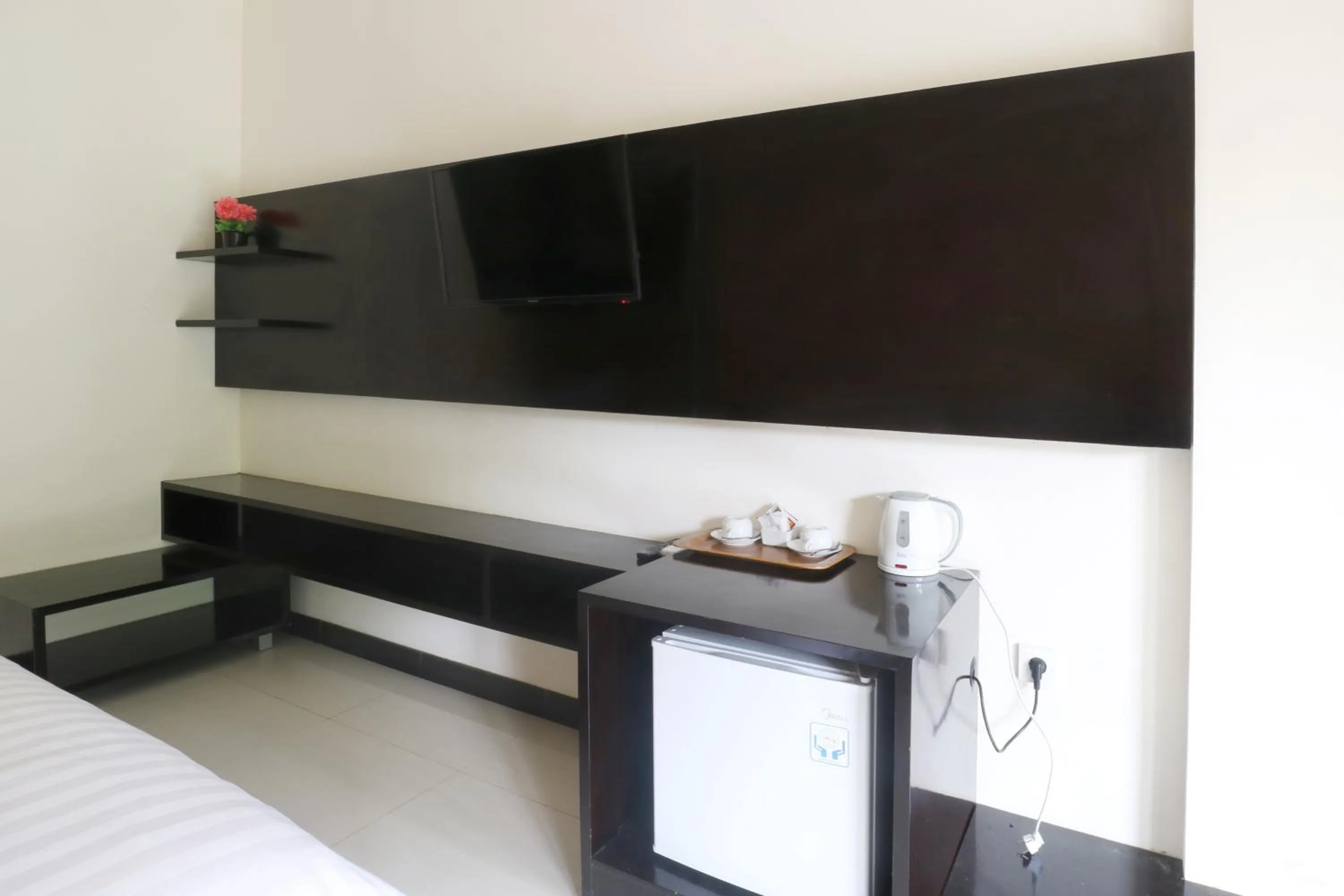 TV and multimedia, Bed in The Umah Pandawa Hotel and Villas