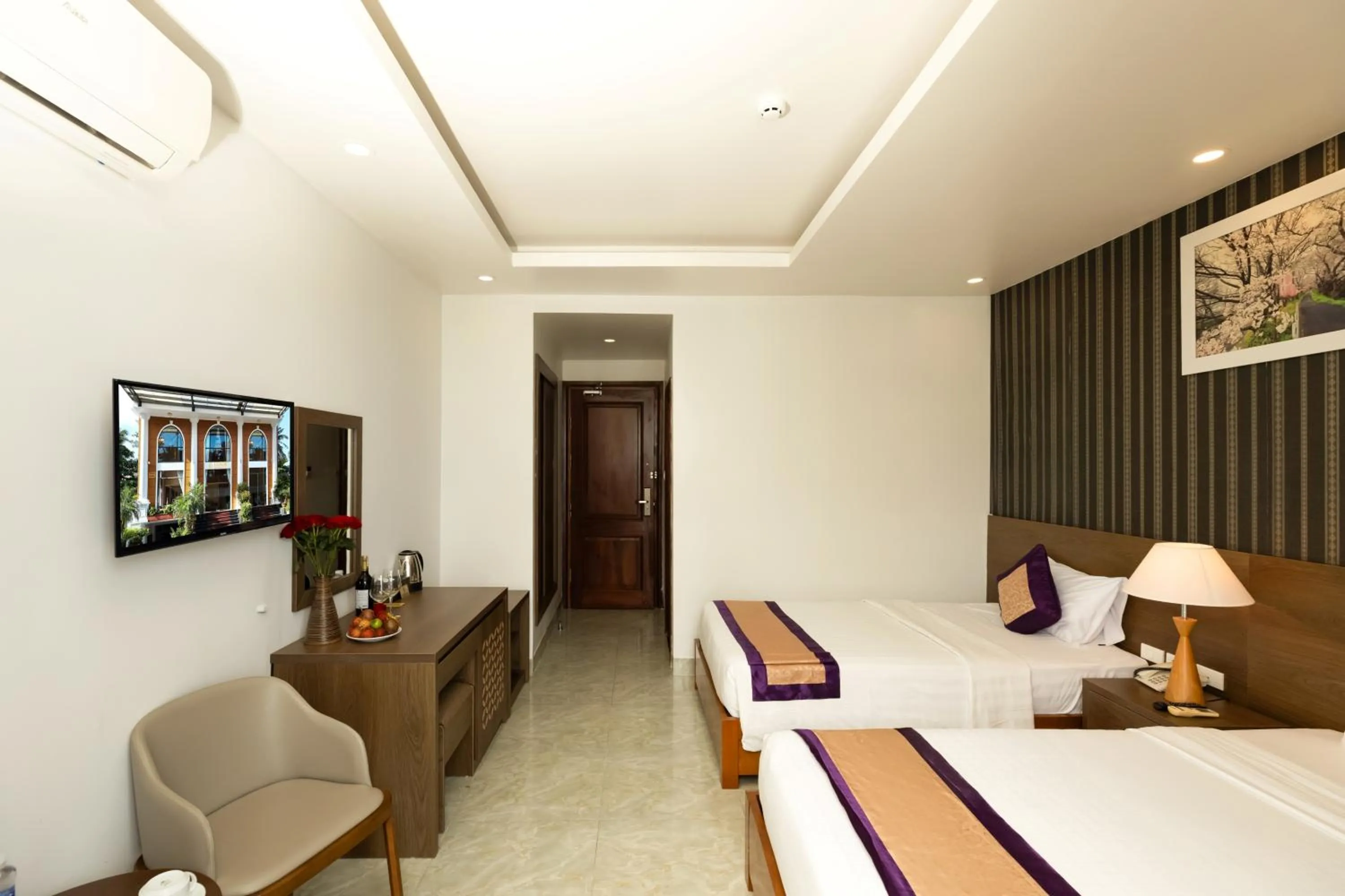 Communal lounge/ TV room, Bed in Luxor Boutique Hotel Phu Quoc