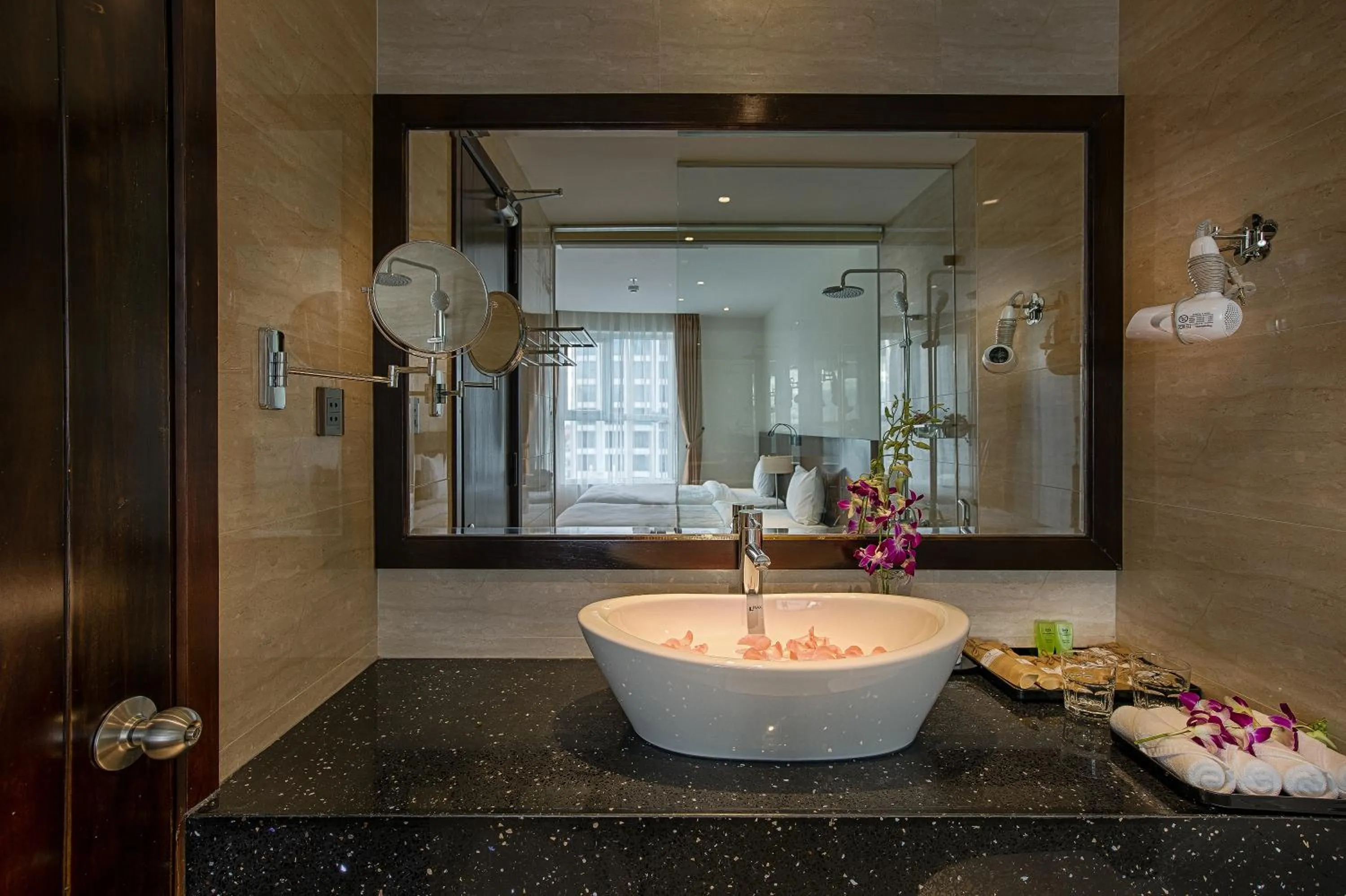 Bathroom in Sofia Suite Hotel & Spa Danang - Free Craft Beer and 20 minute Spa per room