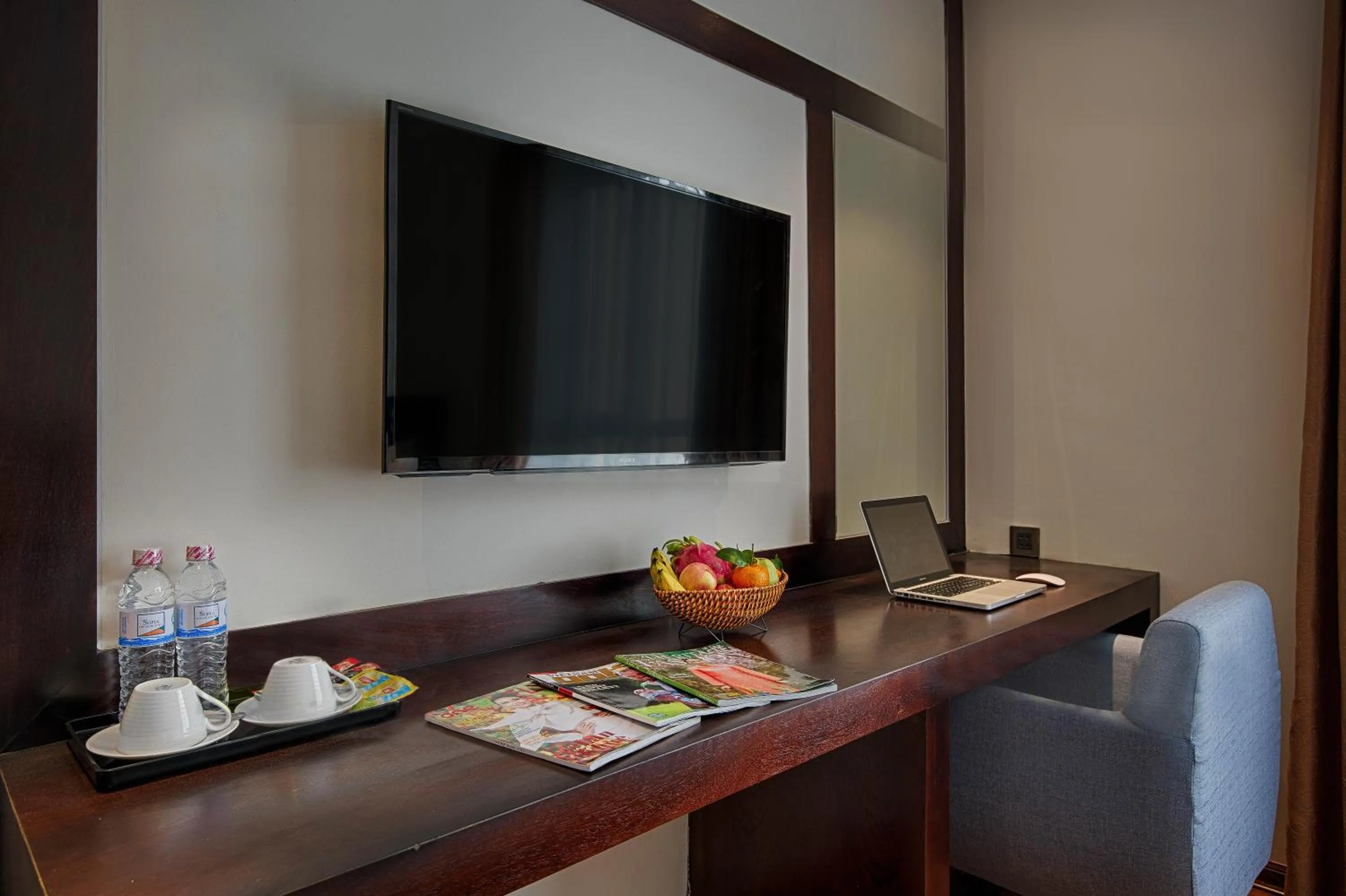 TV and multimedia in Sofia Suite Hotel & Spa Danang - Free Craft Beer and 20 minute Spa per room