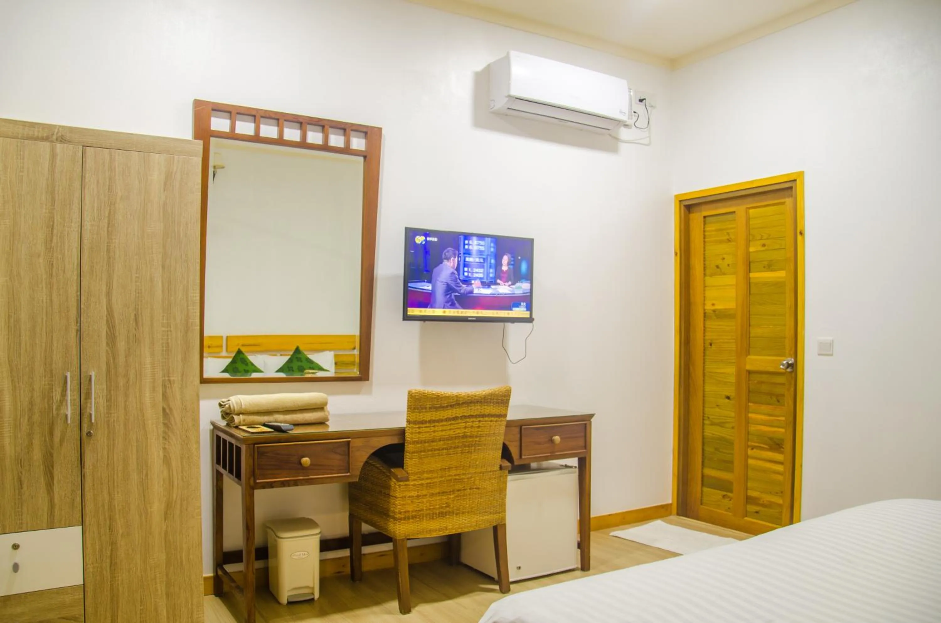 Communal lounge/ TV room, Bed in Holiday Garden Rasdhoo