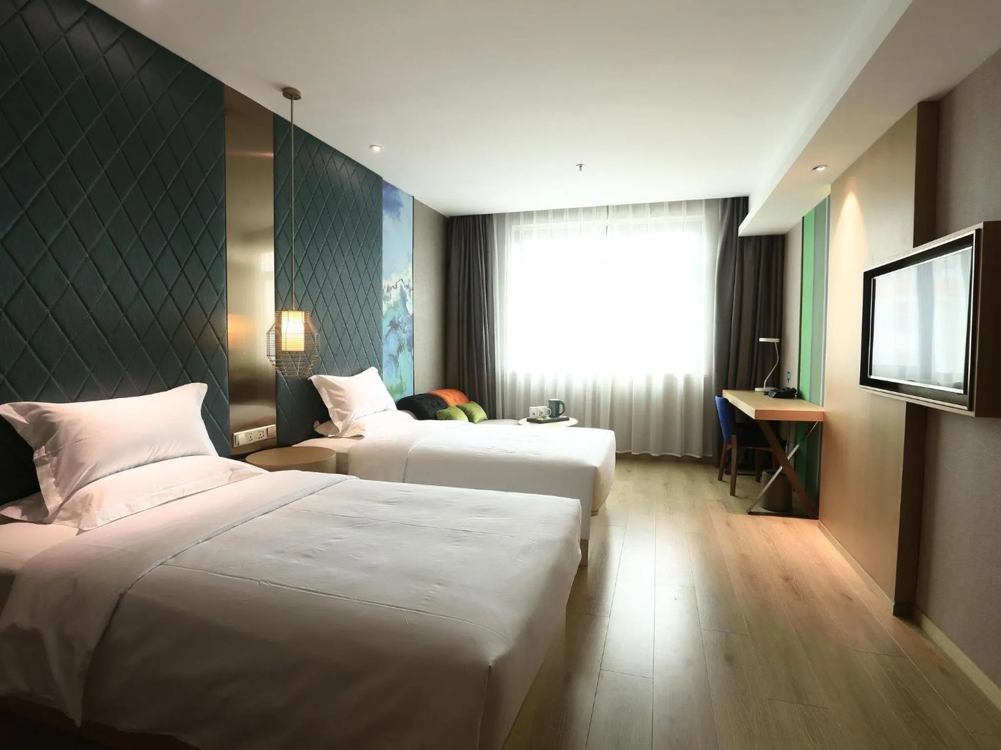Bedroom in Ibis Styles XM Zhongshan Hotel