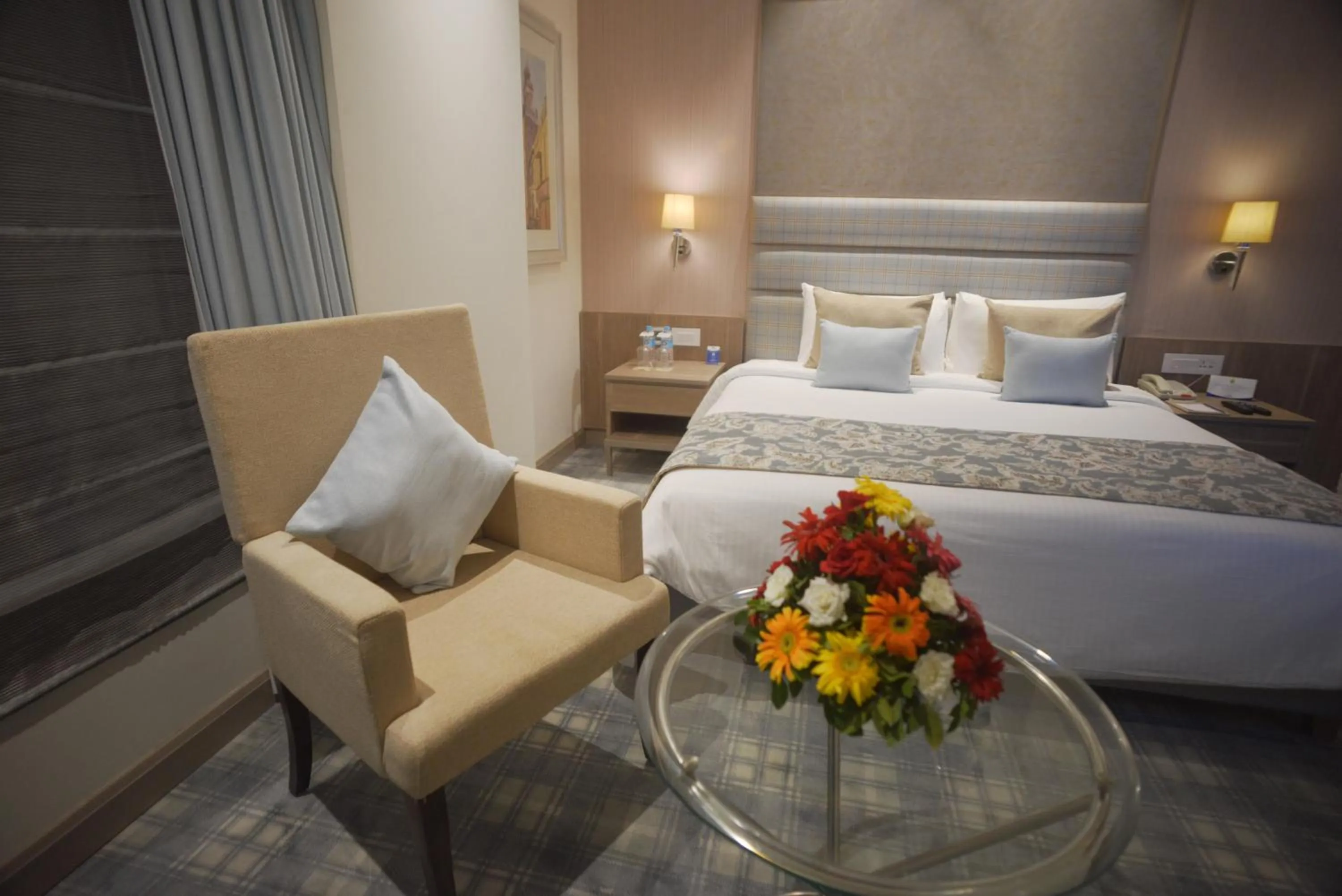 Bedroom, Bed in Efcee Sarovar Premiere Bhavnagar