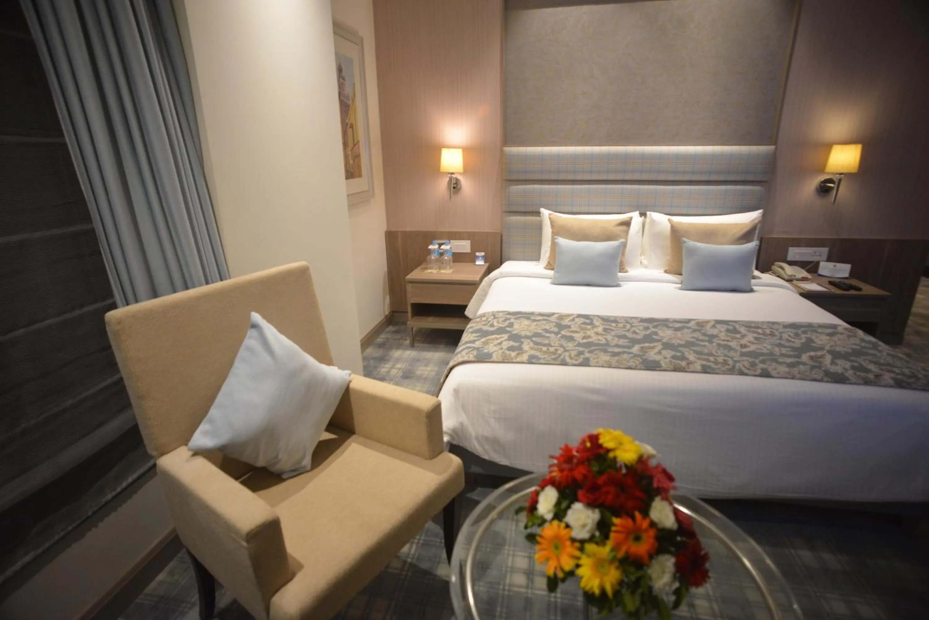 Bedroom, Bed in Efcee Sarovar Premiere Bhavnagar