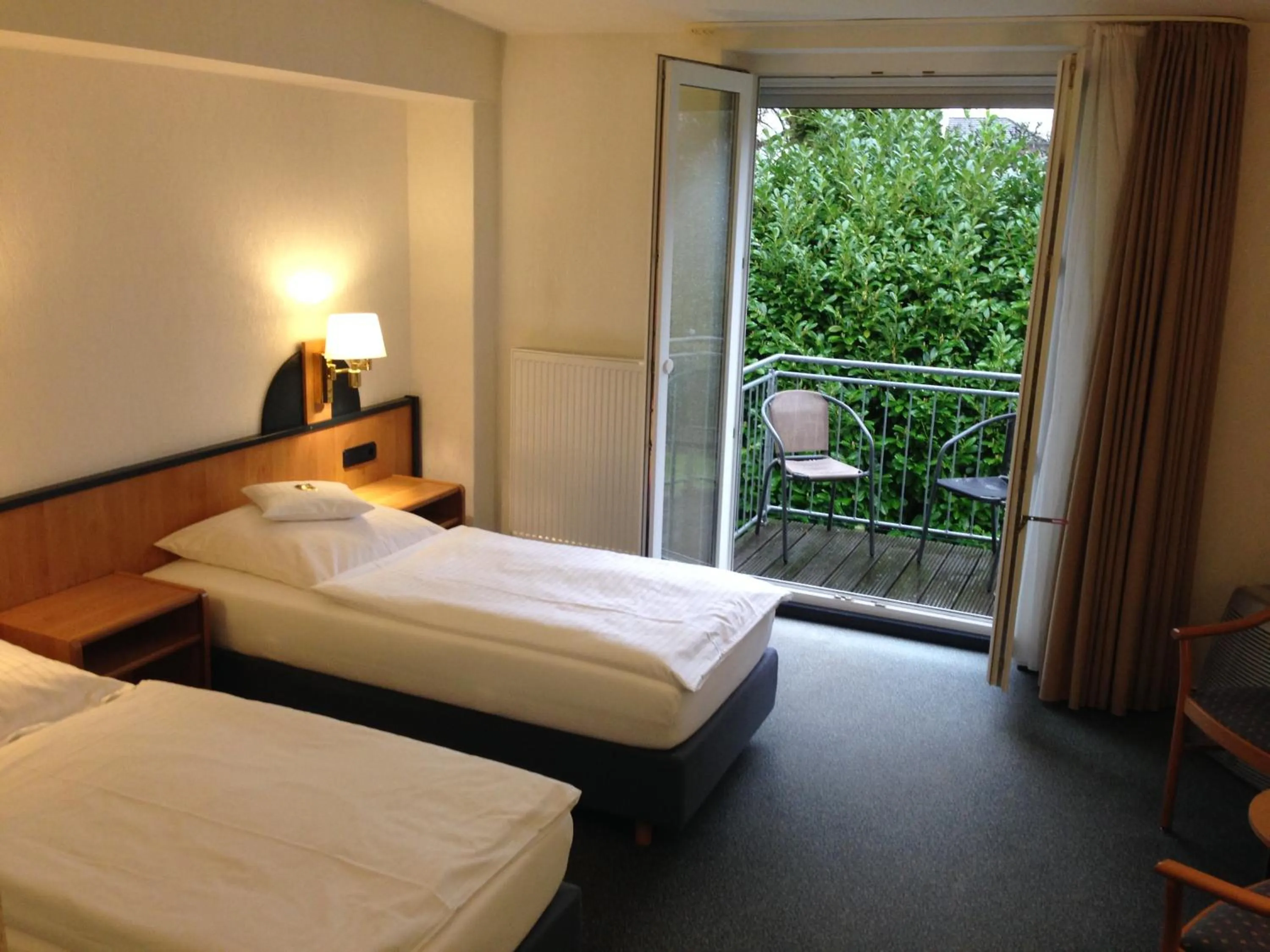 Photo of the whole room, Bed in Hotel Zur Mühle